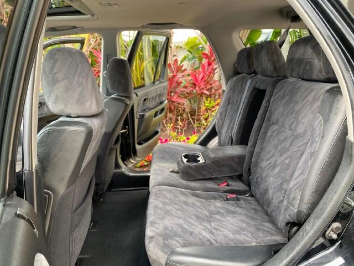 2004 Nighthawk Black Pearl /Black Honda CR-V 4WD EX LOW MILES 61,201 1 OWNER (SHSRD78874U) with an 2.4L DOHC PGM-FI 16-Valve i-VTEC I4 Engine engine, Automatic transmission, located at 4701 North Dixie Hwy, Pompano Beach, FL, 33064, (954) 422-2889, 26.240938, -80.123474 - OUR WEBPAGE FLORIDACARS1.COM HAS OVER 100 PHOTOS AND FREE CARFAX LINK 2004 Honda CR-V EX 1 OWNER 4 Door Wagon/Sport Utility 2.4L I4 F DOHC Gasoline 26 MPG All Wheel Drive Features Air Conditioning Alloy Wheels Cloth Seats Cruise Control Power Locks Power Mirrors Power Windows Sunroof(s) 2004 Honda C - Photo#14