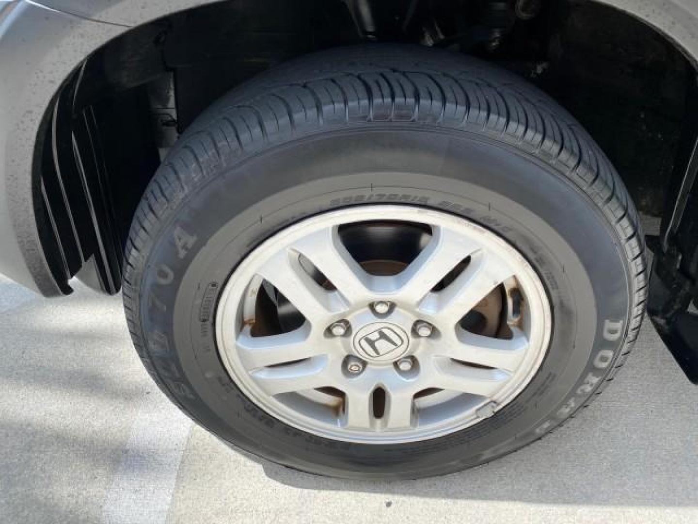 2004 Nighthawk Black Pearl /Black Honda CR-V 4WD EX LOW MILES 61,201 1 OWNER (SHSRD78874U) with an 2.4L DOHC PGM-FI 16-Valve i-VTEC I4 Engine engine, Automatic transmission, located at 4701 North Dixie Hwy, Pompano Beach, FL, 33064, (954) 422-2889, 26.240938, -80.123474 - OUR WEBPAGE FLORIDACARS1.COM HAS OVER 100 PHOTOS AND FREE CARFAX LINK 2004 Honda CR-V EX 1 OWNER 4 Door Wagon/Sport Utility 2.4L I4 F DOHC Gasoline 26 MPG All Wheel Drive Features Air Conditioning Alloy Wheels Cloth Seats Cruise Control Power Locks Power Mirrors Power Windows Sunroof(s) 2004 Honda C - Photo#19