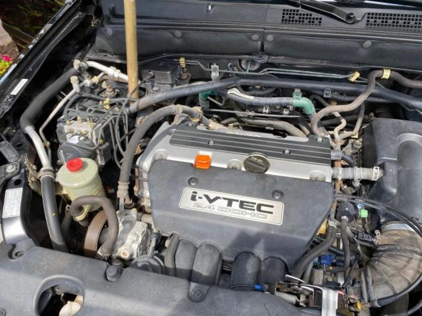 2004 Nighthawk Black Pearl /Black Honda CR-V 4WD EX LOW MILES 61,201 1 OWNER (SHSRD78874U) with an 2.4L DOHC PGM-FI 16-Valve i-VTEC I4 Engine engine, Automatic transmission, located at 4701 North Dixie Hwy, Pompano Beach, FL, 33064, (954) 422-2889, 26.240938, -80.123474 - OUR WEBPAGE FLORIDACARS1.COM HAS OVER 100 PHOTOS AND FREE CARFAX LINK 2004 Honda CR-V EX 1 OWNER 4 Door Wagon/Sport Utility 2.4L I4 F DOHC Gasoline 26 MPG All Wheel Drive Features Air Conditioning Alloy Wheels Cloth Seats Cruise Control Power Locks Power Mirrors Power Windows Sunroof(s) 2004 Honda C - Photo#24
