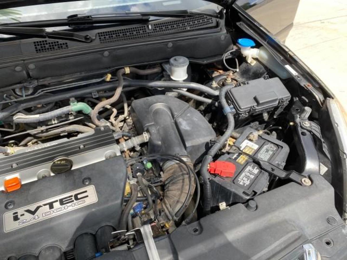 2004 Nighthawk Black Pearl /Black Honda CR-V 4WD EX LOW MILES 61,201 1 OWNER (SHSRD78874U) with an 2.4L DOHC PGM-FI 16-Valve i-VTEC I4 Engine engine, Automatic transmission, located at 4701 North Dixie Hwy, Pompano Beach, FL, 33064, (954) 422-2889, 26.240938, -80.123474 - OUR WEBPAGE FLORIDACARS1.COM HAS OVER 100 PHOTOS AND FREE CARFAX LINK 2004 Honda CR-V EX 1 OWNER 4 Door Wagon/Sport Utility 2.4L I4 F DOHC Gasoline 26 MPG All Wheel Drive Features Air Conditioning Alloy Wheels Cloth Seats Cruise Control Power Locks Power Mirrors Power Windows Sunroof(s) 2004 Honda C - Photo#25