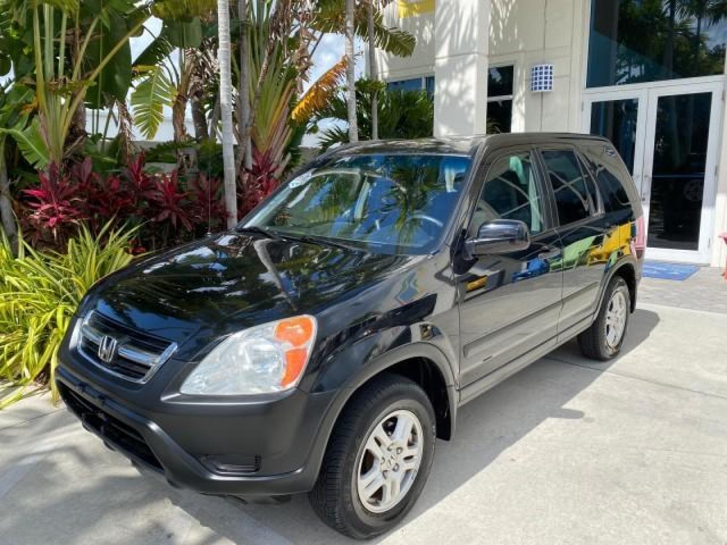 2004 Nighthawk Black Pearl /Black Honda CR-V 4WD EX LOW MILES 61,201 1 OWNER (SHSRD78874U) with an 2.4L DOHC PGM-FI 16-Valve i-VTEC I4 Engine engine, Automatic transmission, located at 4701 North Dixie Hwy, Pompano Beach, FL, 33064, (954) 422-2889, 26.240938, -80.123474 - OUR WEBPAGE FLORIDACARS1.COM HAS OVER 100 PHOTOS AND FREE CARFAX LINK 2004 Honda CR-V EX 1 OWNER 4 Door Wagon/Sport Utility 2.4L I4 F DOHC Gasoline 26 MPG All Wheel Drive Features Air Conditioning Alloy Wheels Cloth Seats Cruise Control Power Locks Power Mirrors Power Windows Sunroof(s) 2004 Honda C - Photo#29