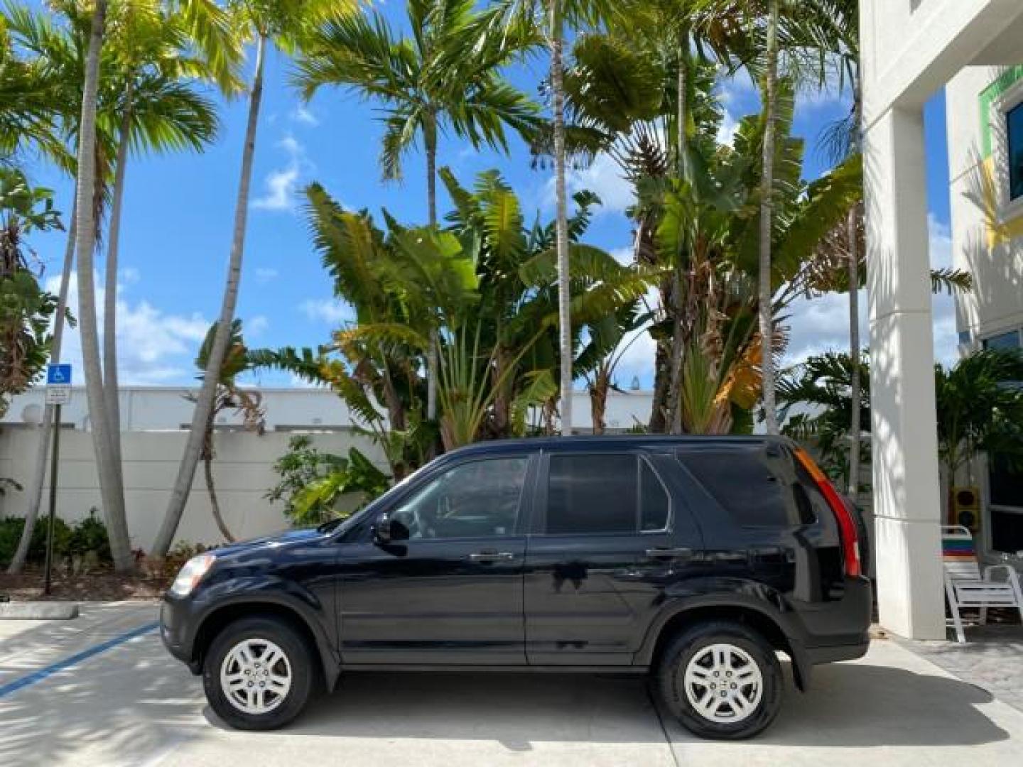 2004 Nighthawk Black Pearl /Black Honda CR-V 4WD EX LOW MILES 61,201 1 OWNER (SHSRD78874U) with an 2.4L DOHC PGM-FI 16-Valve i-VTEC I4 Engine engine, Automatic transmission, located at 4701 North Dixie Hwy, Pompano Beach, FL, 33064, (954) 422-2889, 26.240938, -80.123474 - OUR WEBPAGE FLORIDACARS1.COM HAS OVER 100 PHOTOS AND FREE CARFAX LINK 2004 Honda CR-V EX 1 OWNER 4 Door Wagon/Sport Utility 2.4L I4 F DOHC Gasoline 26 MPG All Wheel Drive Features Air Conditioning Alloy Wheels Cloth Seats Cruise Control Power Locks Power Mirrors Power Windows Sunroof(s) 2004 Honda C - Photo#30