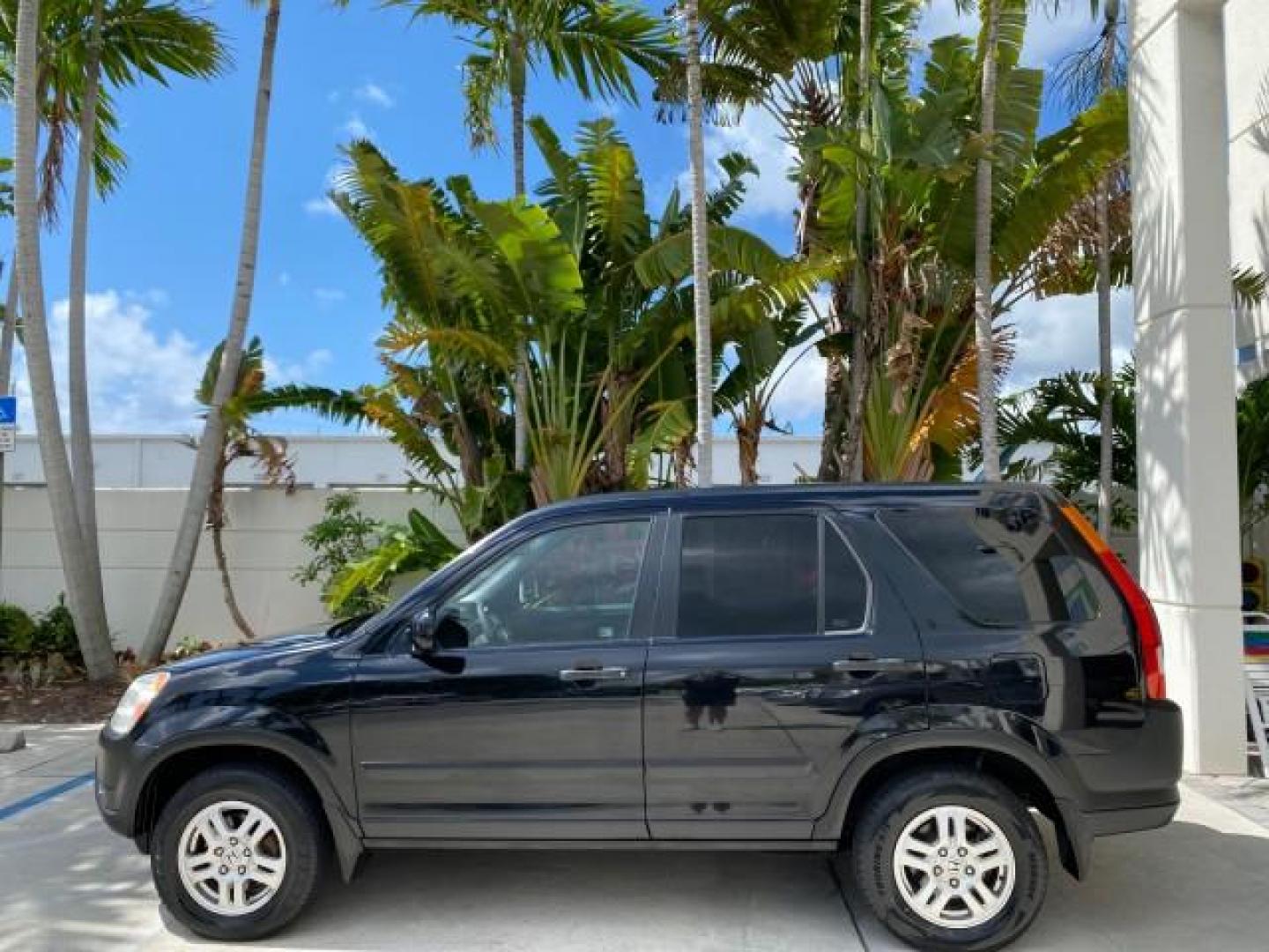 2004 Nighthawk Black Pearl /Black Honda CR-V 4WD EX LOW MILES 61,201 1 OWNER (SHSRD78874U) with an 2.4L DOHC PGM-FI 16-Valve i-VTEC I4 Engine engine, Automatic transmission, located at 4701 North Dixie Hwy, Pompano Beach, FL, 33064, (954) 422-2889, 26.240938, -80.123474 - OUR WEBPAGE FLORIDACARS1.COM HAS OVER 100 PHOTOS AND FREE CARFAX LINK 2004 Honda CR-V EX 1 OWNER 4 Door Wagon/Sport Utility 2.4L I4 F DOHC Gasoline 26 MPG All Wheel Drive Features Air Conditioning Alloy Wheels Cloth Seats Cruise Control Power Locks Power Mirrors Power Windows Sunroof(s) 2004 Honda C - Photo#31