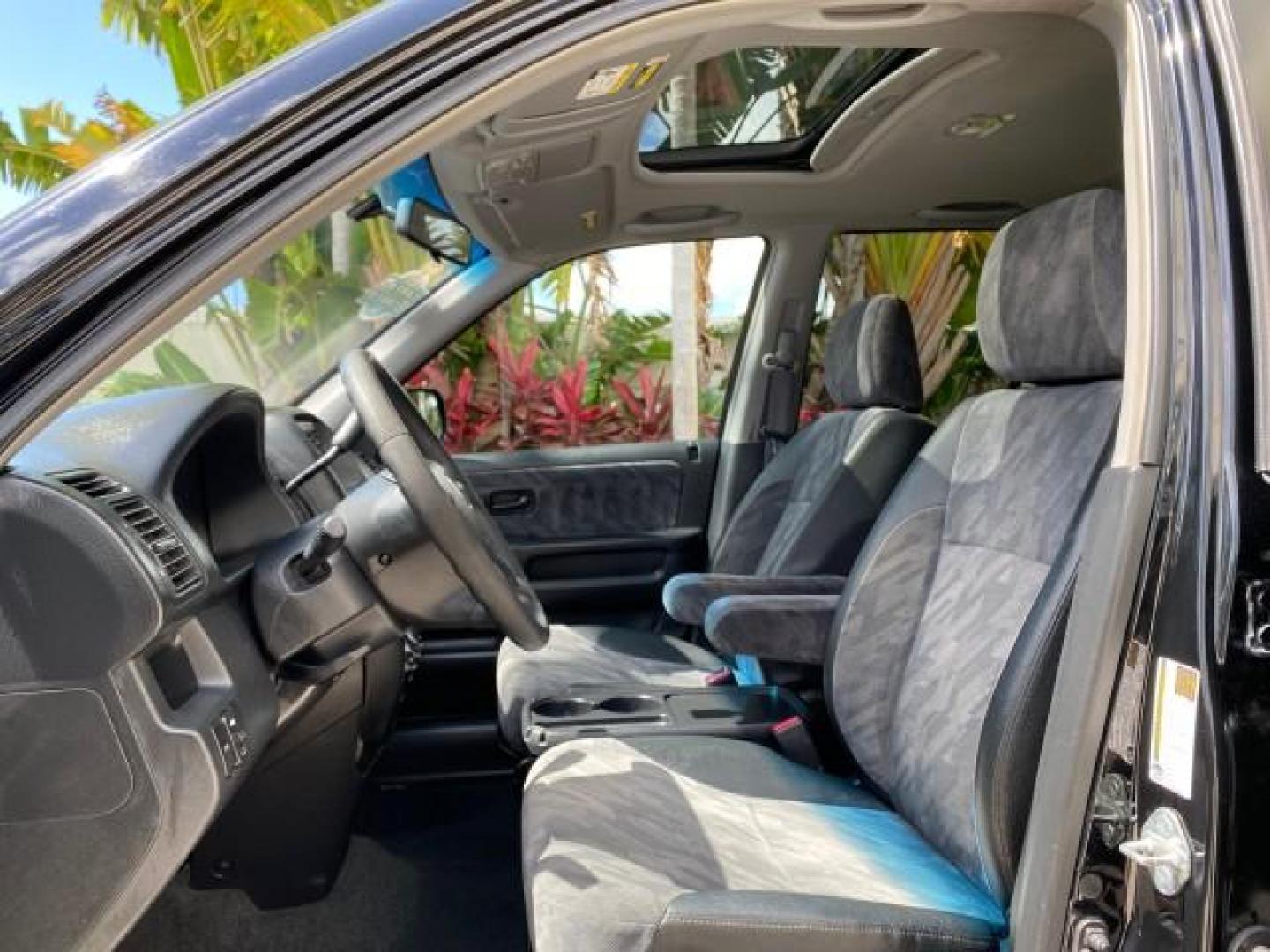 2004 Nighthawk Black Pearl /Black Honda CR-V 4WD EX LOW MILES 61,201 1 OWNER (SHSRD78874U) with an 2.4L DOHC PGM-FI 16-Valve i-VTEC I4 Engine engine, Automatic transmission, located at 4701 North Dixie Hwy, Pompano Beach, FL, 33064, (954) 422-2889, 26.240938, -80.123474 - OUR WEBPAGE FLORIDACARS1.COM HAS OVER 100 PHOTOS AND FREE CARFAX LINK 2004 Honda CR-V EX 1 OWNER 4 Door Wagon/Sport Utility 2.4L I4 F DOHC Gasoline 26 MPG All Wheel Drive Features Air Conditioning Alloy Wheels Cloth Seats Cruise Control Power Locks Power Mirrors Power Windows Sunroof(s) 2004 Honda C - Photo#39