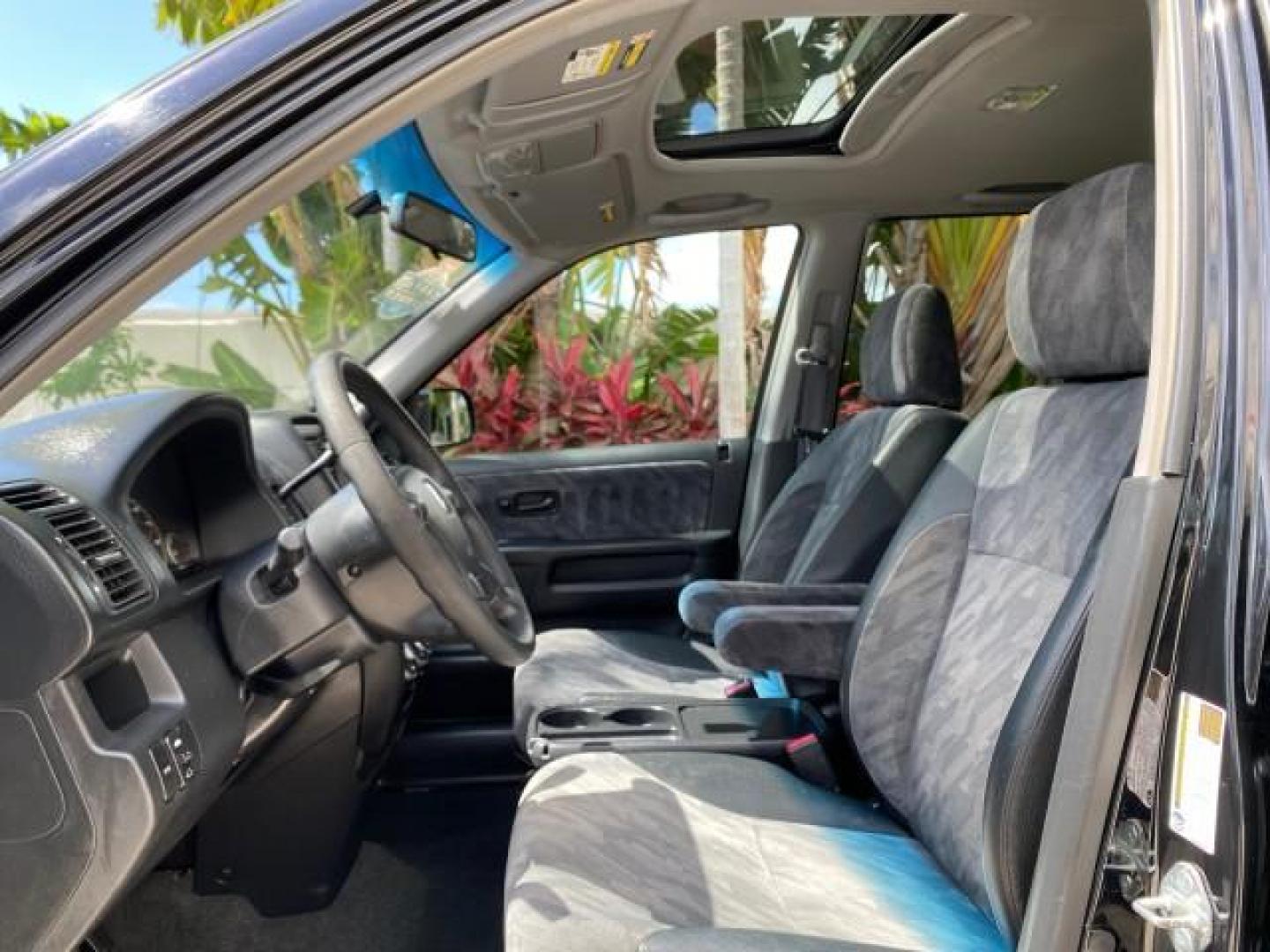 2004 Nighthawk Black Pearl /Black Honda CR-V 4WD EX LOW MILES 61,201 1 OWNER (SHSRD78874U) with an 2.4L DOHC PGM-FI 16-Valve i-VTEC I4 Engine engine, Automatic transmission, located at 4701 North Dixie Hwy, Pompano Beach, FL, 33064, (954) 422-2889, 26.240938, -80.123474 - OUR WEBPAGE FLORIDACARS1.COM HAS OVER 100 PHOTOS AND FREE CARFAX LINK 2004 Honda CR-V EX 1 OWNER 4 Door Wagon/Sport Utility 2.4L I4 F DOHC Gasoline 26 MPG All Wheel Drive Features Air Conditioning Alloy Wheels Cloth Seats Cruise Control Power Locks Power Mirrors Power Windows Sunroof(s) 2004 Honda C - Photo#40