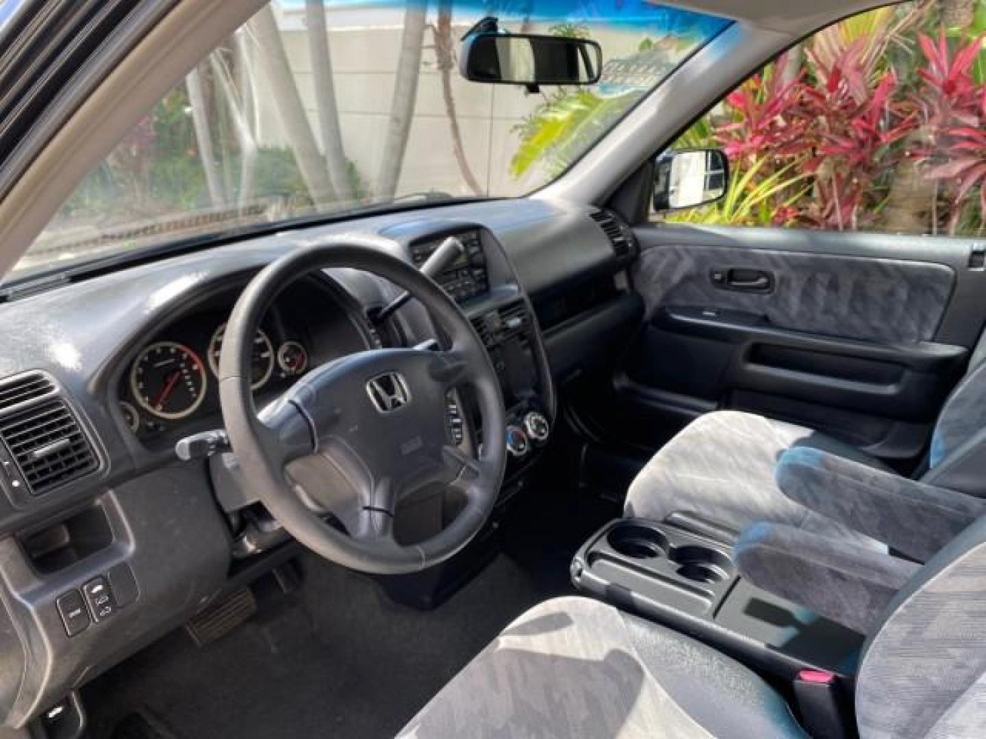 2004 Nighthawk Black Pearl /Black Honda CR-V 4WD EX LOW MILES 61,201 1 OWNER (SHSRD78874U) with an 2.4L DOHC PGM-FI 16-Valve i-VTEC I4 Engine engine, Automatic transmission, located at 4701 North Dixie Hwy, Pompano Beach, FL, 33064, (954) 422-2889, 26.240938, -80.123474 - OUR WEBPAGE FLORIDACARS1.COM HAS OVER 100 PHOTOS AND FREE CARFAX LINK 2004 Honda CR-V EX 1 OWNER 4 Door Wagon/Sport Utility 2.4L I4 F DOHC Gasoline 26 MPG All Wheel Drive Features Air Conditioning Alloy Wheels Cloth Seats Cruise Control Power Locks Power Mirrors Power Windows Sunroof(s) 2004 Honda C - Photo#42