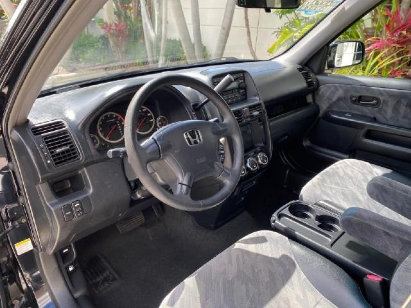 2004 Nighthawk Black Pearl /Black Honda CR-V 4WD EX LOW MILES 61,201 1 OWNER (SHSRD78874U) with an 2.4L DOHC PGM-FI 16-Valve i-VTEC I4 Engine engine, Automatic transmission, located at 4701 North Dixie Hwy, Pompano Beach, FL, 33064, (954) 422-2889, 26.240938, -80.123474 - OUR WEBPAGE FLORIDACARS1.COM HAS OVER 100 PHOTOS AND FREE CARFAX LINK 2004 Honda CR-V EX 1 OWNER 4 Door Wagon/Sport Utility 2.4L I4 F DOHC Gasoline 26 MPG All Wheel Drive Features Air Conditioning Alloy Wheels Cloth Seats Cruise Control Power Locks Power Mirrors Power Windows Sunroof(s) 2004 Honda C - Photo#43