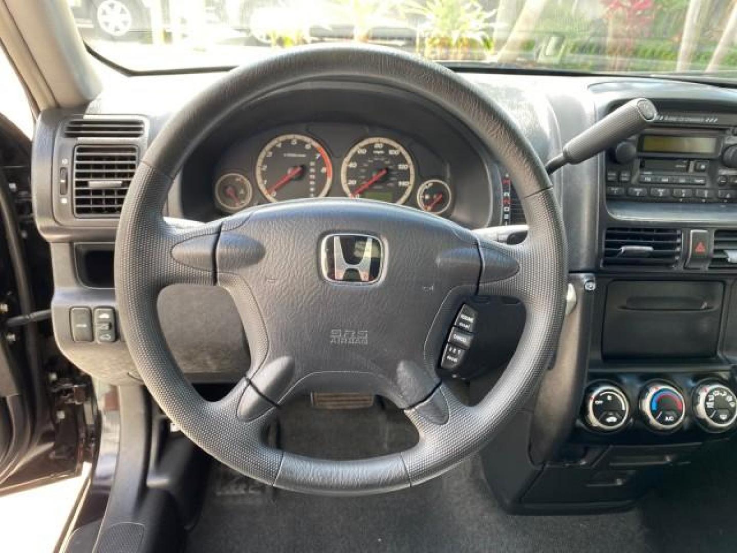 2004 Nighthawk Black Pearl /Black Honda CR-V 4WD EX LOW MILES 61,201 1 OWNER (SHSRD78874U) with an 2.4L DOHC PGM-FI 16-Valve i-VTEC I4 Engine engine, Automatic transmission, located at 4701 North Dixie Hwy, Pompano Beach, FL, 33064, (954) 422-2889, 26.240938, -80.123474 - OUR WEBPAGE FLORIDACARS1.COM HAS OVER 100 PHOTOS AND FREE CARFAX LINK 2004 Honda CR-V EX 1 OWNER 4 Door Wagon/Sport Utility 2.4L I4 F DOHC Gasoline 26 MPG All Wheel Drive Features Air Conditioning Alloy Wheels Cloth Seats Cruise Control Power Locks Power Mirrors Power Windows Sunroof(s) 2004 Honda C - Photo#44