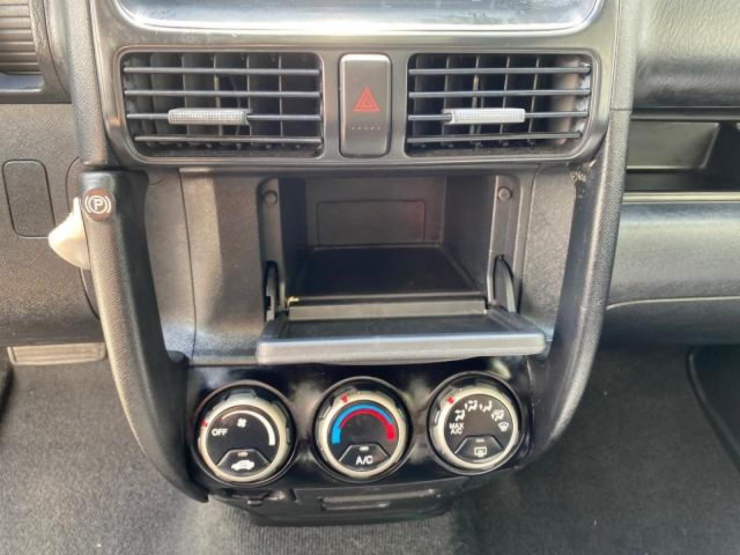 2004 Nighthawk Black Pearl /Black Honda CR-V 4WD EX LOW MILES 61,201 1 OWNER (SHSRD78874U) with an 2.4L DOHC PGM-FI 16-Valve i-VTEC I4 Engine engine, Automatic transmission, located at 4701 North Dixie Hwy, Pompano Beach, FL, 33064, (954) 422-2889, 26.240938, -80.123474 - OUR WEBPAGE FLORIDACARS1.COM HAS OVER 100 PHOTOS AND FREE CARFAX LINK 2004 Honda CR-V EX 1 OWNER 4 Door Wagon/Sport Utility 2.4L I4 F DOHC Gasoline 26 MPG All Wheel Drive Features Air Conditioning Alloy Wheels Cloth Seats Cruise Control Power Locks Power Mirrors Power Windows Sunroof(s) 2004 Honda C - Photo#57