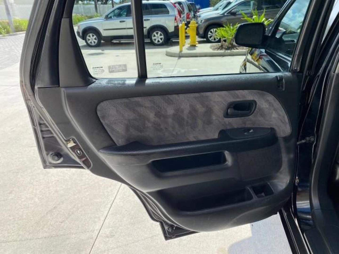 2004 Nighthawk Black Pearl /Black Honda CR-V 4WD EX LOW MILES 61,201 1 OWNER (SHSRD78874U) with an 2.4L DOHC PGM-FI 16-Valve i-VTEC I4 Engine engine, Automatic transmission, located at 4701 North Dixie Hwy, Pompano Beach, FL, 33064, (954) 422-2889, 26.240938, -80.123474 - OUR WEBPAGE FLORIDACARS1.COM HAS OVER 100 PHOTOS AND FREE CARFAX LINK 2004 Honda CR-V EX 1 OWNER 4 Door Wagon/Sport Utility 2.4L I4 F DOHC Gasoline 26 MPG All Wheel Drive Features Air Conditioning Alloy Wheels Cloth Seats Cruise Control Power Locks Power Mirrors Power Windows Sunroof(s) 2004 Honda C - Photo#75