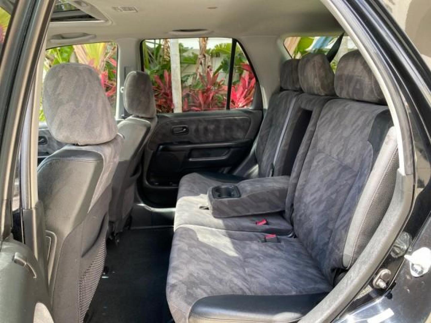 2004 Nighthawk Black Pearl /Black Honda CR-V 4WD EX LOW MILES 61,201 1 OWNER (SHSRD78874U) with an 2.4L DOHC PGM-FI 16-Valve i-VTEC I4 Engine engine, Automatic transmission, located at 4701 North Dixie Hwy, Pompano Beach, FL, 33064, (954) 422-2889, 26.240938, -80.123474 - OUR WEBPAGE FLORIDACARS1.COM HAS OVER 100 PHOTOS AND FREE CARFAX LINK 2004 Honda CR-V EX 1 OWNER 4 Door Wagon/Sport Utility 2.4L I4 F DOHC Gasoline 26 MPG All Wheel Drive Features Air Conditioning Alloy Wheels Cloth Seats Cruise Control Power Locks Power Mirrors Power Windows Sunroof(s) 2004 Honda C - Photo#76