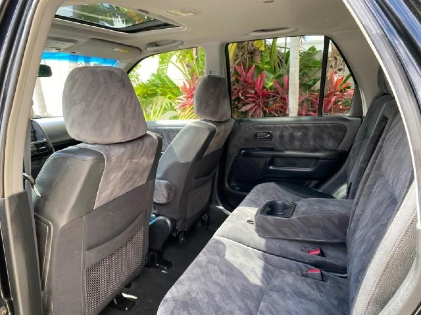 2004 Nighthawk Black Pearl /Black Honda CR-V 4WD EX LOW MILES 61,201 1 OWNER (SHSRD78874U) with an 2.4L DOHC PGM-FI 16-Valve i-VTEC I4 Engine engine, Automatic transmission, located at 4701 North Dixie Hwy, Pompano Beach, FL, 33064, (954) 422-2889, 26.240938, -80.123474 - OUR WEBPAGE FLORIDACARS1.COM HAS OVER 100 PHOTOS AND FREE CARFAX LINK 2004 Honda CR-V EX 1 OWNER 4 Door Wagon/Sport Utility 2.4L I4 F DOHC Gasoline 26 MPG All Wheel Drive Features Air Conditioning Alloy Wheels Cloth Seats Cruise Control Power Locks Power Mirrors Power Windows Sunroof(s) 2004 Honda C - Photo#78