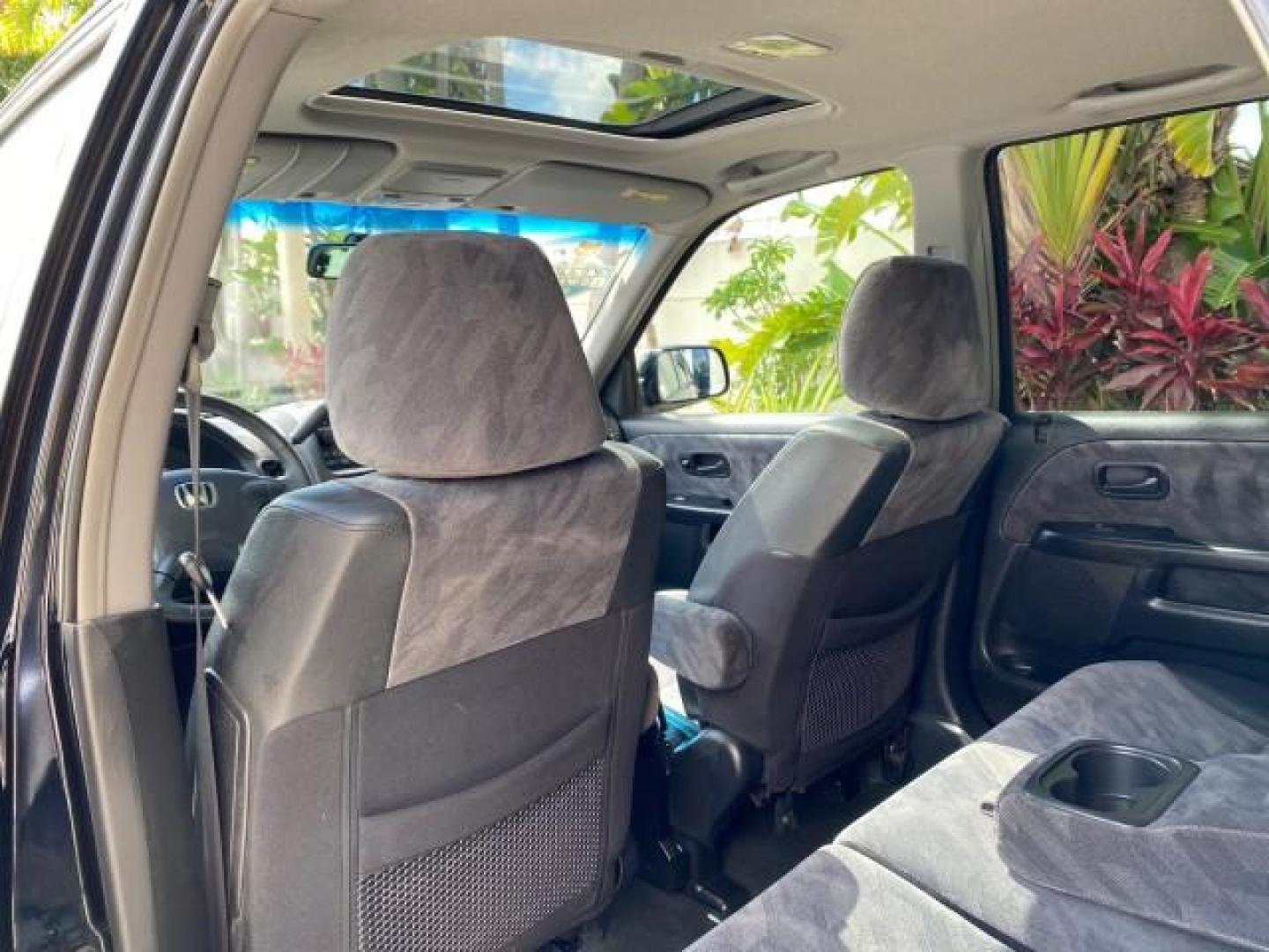 2004 Nighthawk Black Pearl /Black Honda CR-V 4WD EX LOW MILES 61,201 1 OWNER (SHSRD78874U) with an 2.4L DOHC PGM-FI 16-Valve i-VTEC I4 Engine engine, Automatic transmission, located at 4701 North Dixie Hwy, Pompano Beach, FL, 33064, (954) 422-2889, 26.240938, -80.123474 - OUR WEBPAGE FLORIDACARS1.COM HAS OVER 100 PHOTOS AND FREE CARFAX LINK 2004 Honda CR-V EX 1 OWNER 4 Door Wagon/Sport Utility 2.4L I4 F DOHC Gasoline 26 MPG All Wheel Drive Features Air Conditioning Alloy Wheels Cloth Seats Cruise Control Power Locks Power Mirrors Power Windows Sunroof(s) 2004 Honda C - Photo#80