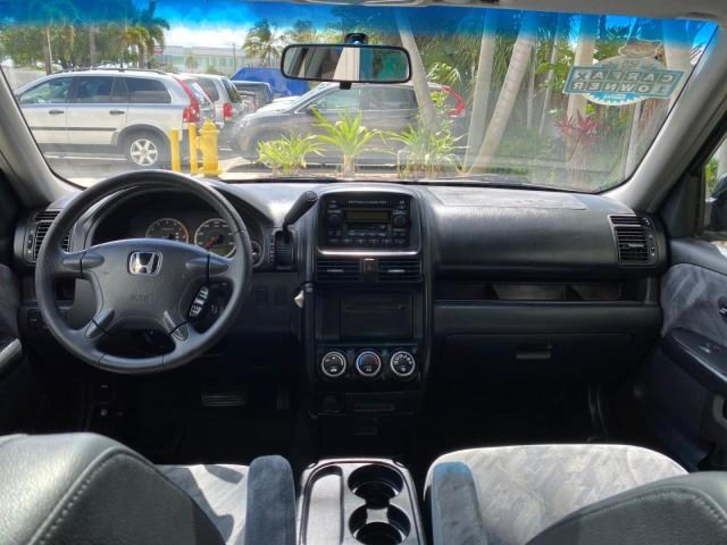2004 Nighthawk Black Pearl /Black Honda CR-V 4WD EX LOW MILES 61,201 1 OWNER (SHSRD78874U) with an 2.4L DOHC PGM-FI 16-Valve i-VTEC I4 Engine engine, Automatic transmission, located at 4701 North Dixie Hwy, Pompano Beach, FL, 33064, (954) 422-2889, 26.240938, -80.123474 - OUR WEBPAGE FLORIDACARS1.COM HAS OVER 100 PHOTOS AND FREE CARFAX LINK 2004 Honda CR-V EX 1 OWNER 4 Door Wagon/Sport Utility 2.4L I4 F DOHC Gasoline 26 MPG All Wheel Drive Features Air Conditioning Alloy Wheels Cloth Seats Cruise Control Power Locks Power Mirrors Power Windows Sunroof(s) 2004 Honda C - Photo#82