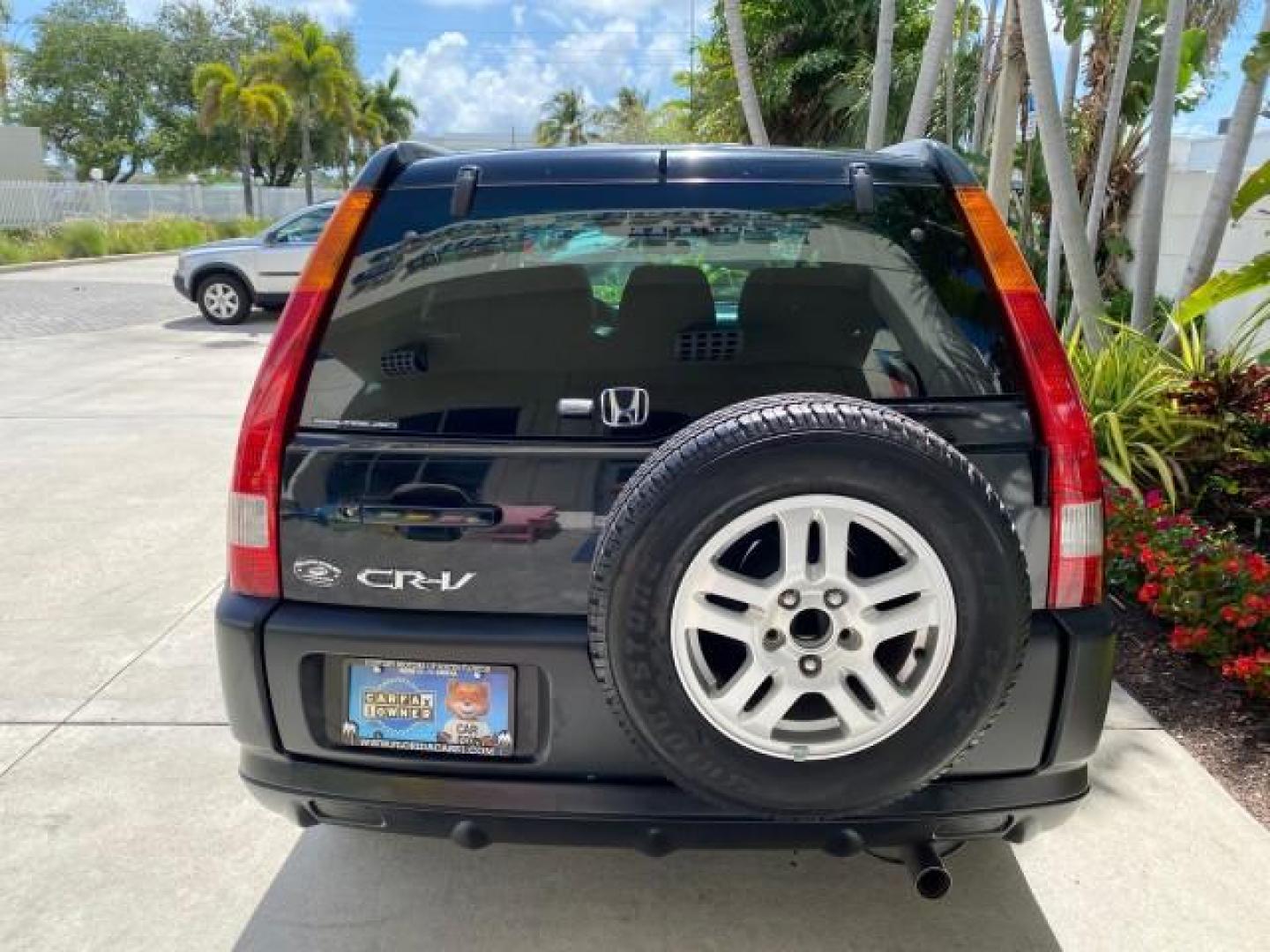 2004 Nighthawk Black Pearl /Black Honda CR-V 4WD EX LOW MILES 61,201 1 OWNER (SHSRD78874U) with an 2.4L DOHC PGM-FI 16-Valve i-VTEC I4 Engine engine, Automatic transmission, located at 4701 North Dixie Hwy, Pompano Beach, FL, 33064, (954) 422-2889, 26.240938, -80.123474 - OUR WEBPAGE FLORIDACARS1.COM HAS OVER 100 PHOTOS AND FREE CARFAX LINK 2004 Honda CR-V EX 1 OWNER 4 Door Wagon/Sport Utility 2.4L I4 F DOHC Gasoline 26 MPG All Wheel Drive Features Air Conditioning Alloy Wheels Cloth Seats Cruise Control Power Locks Power Mirrors Power Windows Sunroof(s) 2004 Honda C - Photo#91