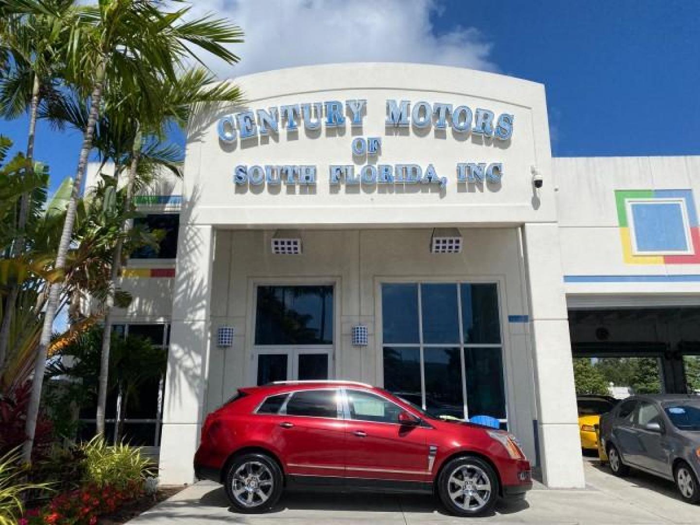 2012 Crystal Red Tintcoat /Shale w/Brownstone accents Cadillac SRX Performance Collection LOW MILES 34,731 (3GYFNBE32CS) with an 3.6L SIDI DOHC V6 VVT Engine engine, Automatic transmission, located at 4701 North Dixie Hwy, Pompano Beach, FL, 33064, (954) 422-2889, 26.240938, -80.123474 - OUR WEBPAGE FLORIDACARS1.COM HAS OVER 100 PHOTOS AND FREE CARFAX LINK 2012 Cadillac SRX 1 OWNER 4 Door Wagon/Sport Utility 3.6L V6 F DOHC 24V Gasoline 24 MPG Front Wheel Drive Features 20 Inch Plus Wheels ABS Brakes Air Conditioning Alloy Wheels AM/FM Stereo Automatic Transmission Auxiliary Audio In- Photo#0