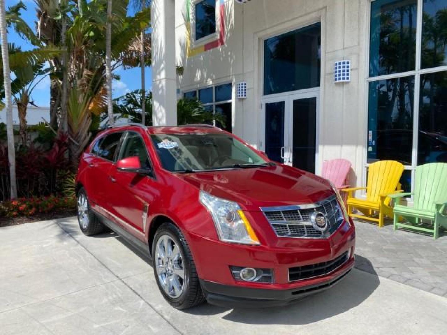 2012 Crystal Red Tintcoat /Shale w/Brownstone accents Cadillac SRX Performance Collection LOW MILES 34,731 (3GYFNBE32CS) with an 3.6L SIDI DOHC V6 VVT Engine engine, Automatic transmission, located at 4701 North Dixie Hwy, Pompano Beach, FL, 33064, (954) 422-2889, 26.240938, -80.123474 - OUR WEBPAGE FLORIDACARS1.COM HAS OVER 100 PHOTOS AND FREE CARFAX LINK 2012 Cadillac SRX 1 OWNER 4 Door Wagon/Sport Utility 3.6L V6 F DOHC 24V Gasoline 24 MPG Front Wheel Drive Features 20 Inch Plus Wheels ABS Brakes Air Conditioning Alloy Wheels AM/FM Stereo Automatic Transmission Auxiliary Audio In- Photo#1
