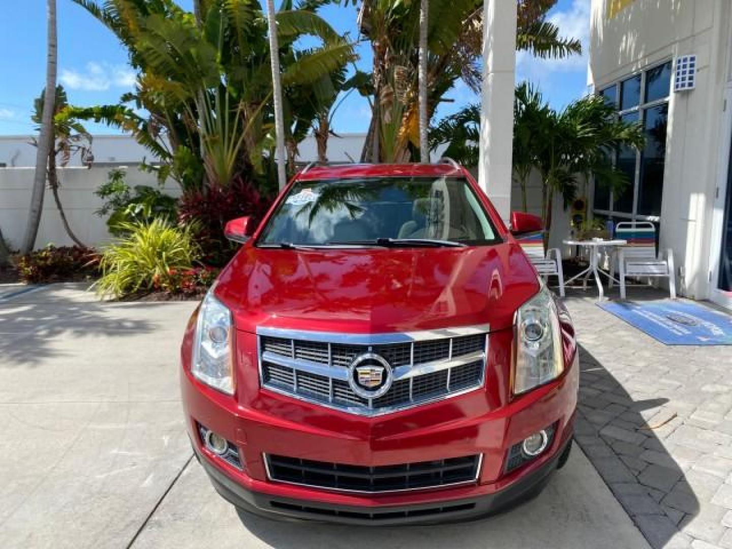 2012 Crystal Red Tintcoat /Shale w/Brownstone accents Cadillac SRX Performance Collection LOW MILES 34,731 (3GYFNBE32CS) with an 3.6L SIDI DOHC V6 VVT Engine engine, Automatic transmission, located at 4701 North Dixie Hwy, Pompano Beach, FL, 33064, (954) 422-2889, 26.240938, -80.123474 - OUR WEBPAGE FLORIDACARS1.COM HAS OVER 100 PHOTOS AND FREE CARFAX LINK 2012 Cadillac SRX 1 OWNER 4 Door Wagon/Sport Utility 3.6L V6 F DOHC 24V Gasoline 24 MPG Front Wheel Drive Features 20 Inch Plus Wheels ABS Brakes Air Conditioning Alloy Wheels AM/FM Stereo Automatic Transmission Auxiliary Audio In- Photo#2