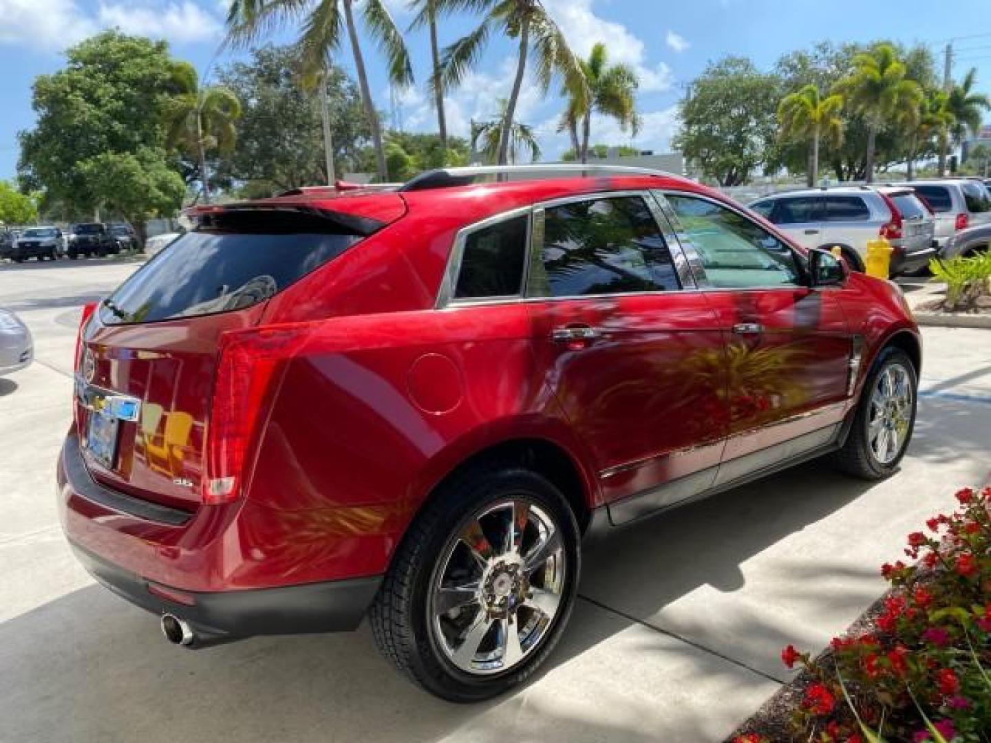 2012 Crystal Red Tintcoat /Shale w/Brownstone accents Cadillac SRX Performance Collection LOW MILES 34,731 (3GYFNBE32CS) with an 3.6L SIDI DOHC V6 VVT Engine engine, Automatic transmission, located at 4701 North Dixie Hwy, Pompano Beach, FL, 33064, (954) 422-2889, 26.240938, -80.123474 - OUR WEBPAGE FLORIDACARS1.COM HAS OVER 100 PHOTOS AND FREE CARFAX LINK 2012 Cadillac SRX 1 OWNER 4 Door Wagon/Sport Utility 3.6L V6 F DOHC 24V Gasoline 24 MPG Front Wheel Drive Features 20 Inch Plus Wheels ABS Brakes Air Conditioning Alloy Wheels AM/FM Stereo Automatic Transmission Auxiliary Audio In- Photo#7