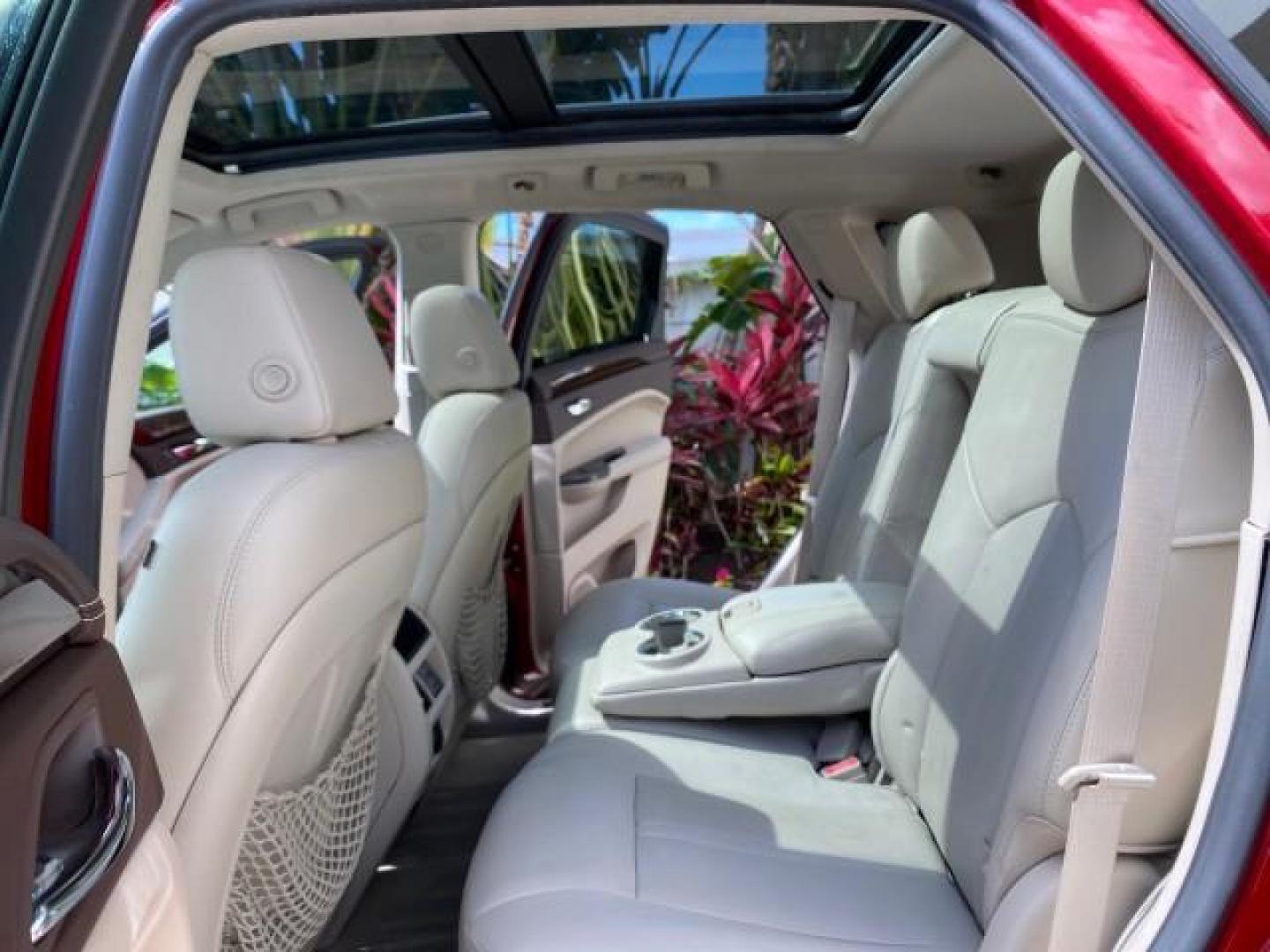 2012 Crystal Red Tintcoat /Shale w/Brownstone accents Cadillac SRX Performance Collection LOW MILES 34,731 (3GYFNBE32CS) with an 3.6L SIDI DOHC V6 VVT Engine engine, Automatic transmission, located at 4701 North Dixie Hwy, Pompano Beach, FL, 33064, (954) 422-2889, 26.240938, -80.123474 - OUR WEBPAGE FLORIDACARS1.COM HAS OVER 100 PHOTOS AND FREE CARFAX LINK 2012 Cadillac SRX 1 OWNER 4 Door Wagon/Sport Utility 3.6L V6 F DOHC 24V Gasoline 24 MPG Front Wheel Drive Features 20 Inch Plus Wheels ABS Brakes Air Conditioning Alloy Wheels AM/FM Stereo Automatic Transmission Auxiliary Audio In- Photo#14