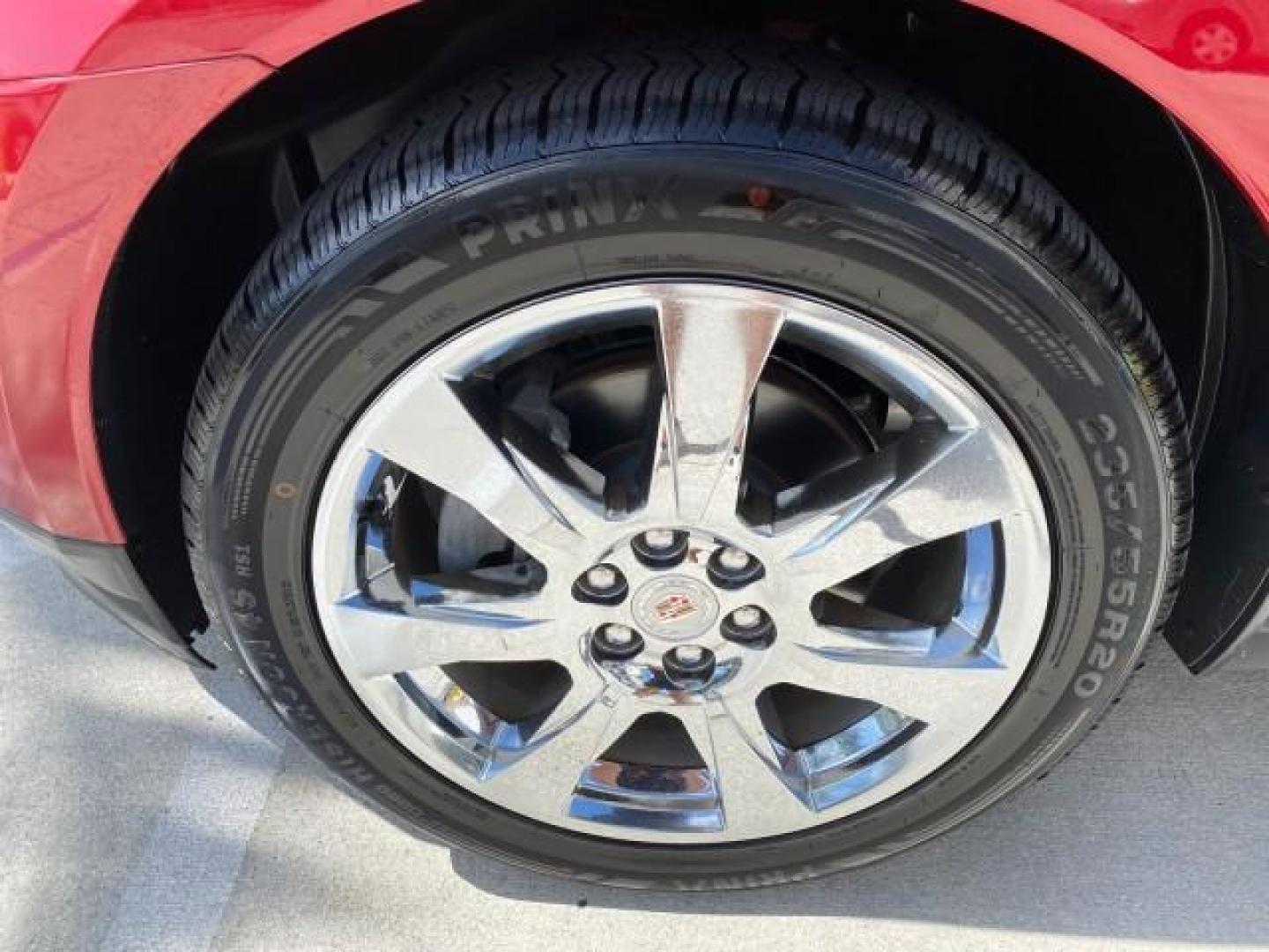 2012 Crystal Red Tintcoat /Shale w/Brownstone accents Cadillac SRX Performance Collection LOW MILES 34,731 (3GYFNBE32CS) with an 3.6L SIDI DOHC V6 VVT Engine engine, Automatic transmission, located at 4701 North Dixie Hwy, Pompano Beach, FL, 33064, (954) 422-2889, 26.240938, -80.123474 - OUR WEBPAGE FLORIDACARS1.COM HAS OVER 100 PHOTOS AND FREE CARFAX LINK 2012 Cadillac SRX 1 OWNER 4 Door Wagon/Sport Utility 3.6L V6 F DOHC 24V Gasoline 24 MPG Front Wheel Drive Features 20 Inch Plus Wheels ABS Brakes Air Conditioning Alloy Wheels AM/FM Stereo Automatic Transmission Auxiliary Audio In- Photo#19