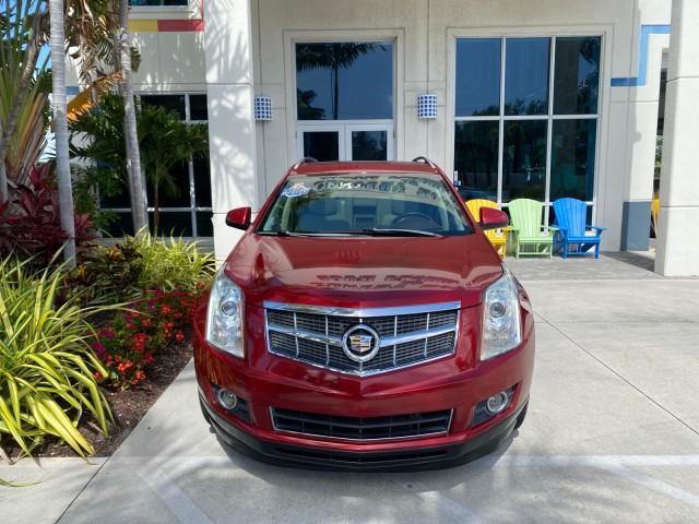 2012 Crystal Red Tintcoat /Shale w/Brownstone accents Cadillac SRX Performance Collection LOW MILES 34,731 (3GYFNBE32CS) with an 3.6L SIDI DOHC V6 VVT Engine engine, Automatic transmission, located at 4701 North Dixie Hwy, Pompano Beach, FL, 33064, (954) 422-2889, 26.240938, -80.123474 - OUR WEBPAGE FLORIDACARS1.COM HAS OVER 100 PHOTOS AND FREE CARFAX LINK 2012 Cadillac SRX 1 OWNER 4 Door Wagon/Sport Utility 3.6L V6 F DOHC 24V Gasoline 24 MPG Front Wheel Drive Features 20 Inch Plus Wheels ABS Brakes Air Conditioning Alloy Wheels AM/FM Stereo Automatic Transmission Auxiliary Audio In - Photo#26