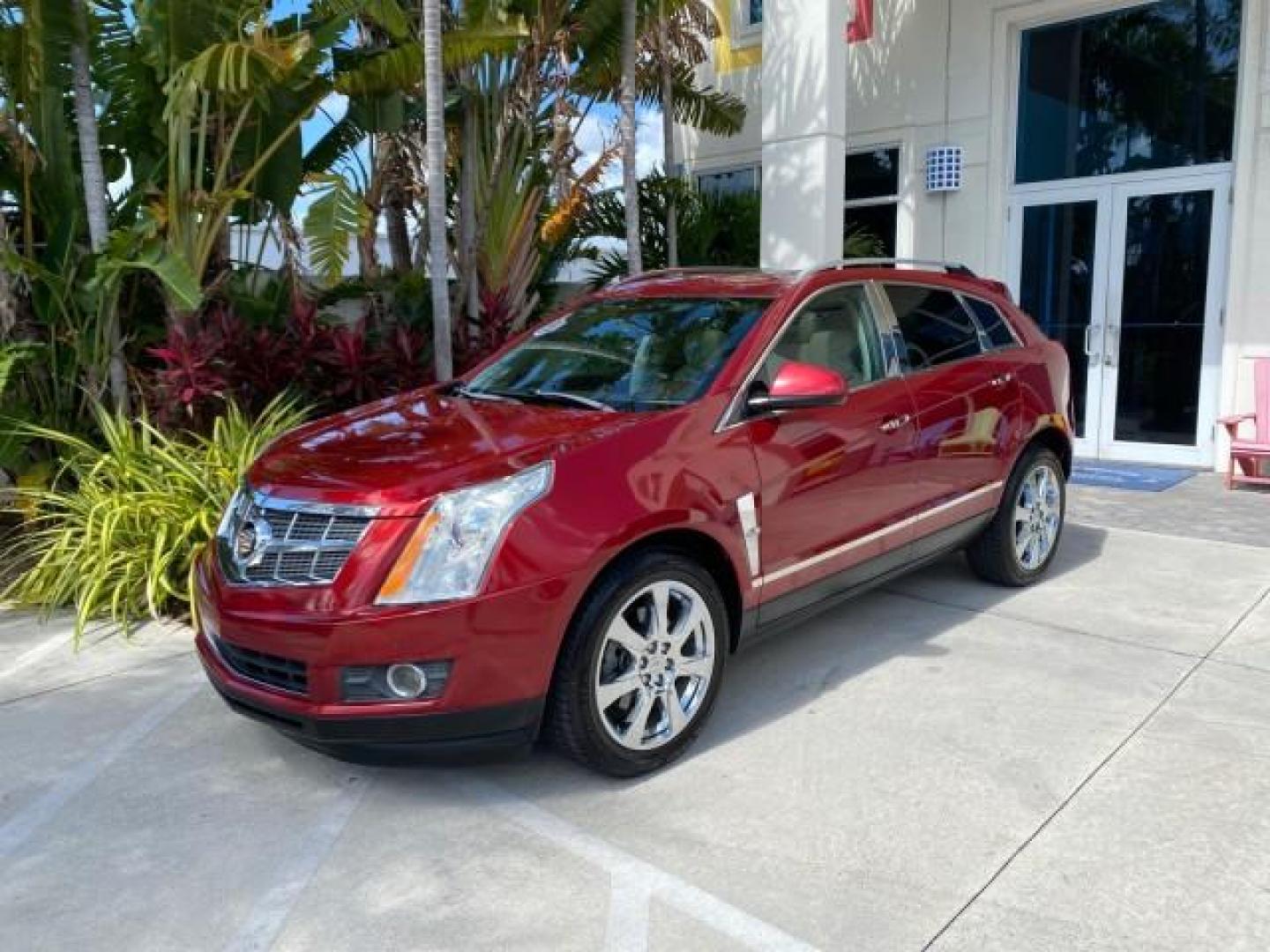 2012 Crystal Red Tintcoat /Shale w/Brownstone accents Cadillac SRX Performance Collection LOW MILES 34,731 (3GYFNBE32CS) with an 3.6L SIDI DOHC V6 VVT Engine engine, Automatic transmission, located at 4701 North Dixie Hwy, Pompano Beach, FL, 33064, (954) 422-2889, 26.240938, -80.123474 - OUR WEBPAGE FLORIDACARS1.COM HAS OVER 100 PHOTOS AND FREE CARFAX LINK 2012 Cadillac SRX 1 OWNER 4 Door Wagon/Sport Utility 3.6L V6 F DOHC 24V Gasoline 24 MPG Front Wheel Drive Features 20 Inch Plus Wheels ABS Brakes Air Conditioning Alloy Wheels AM/FM Stereo Automatic Transmission Auxiliary Audio In- Photo#28