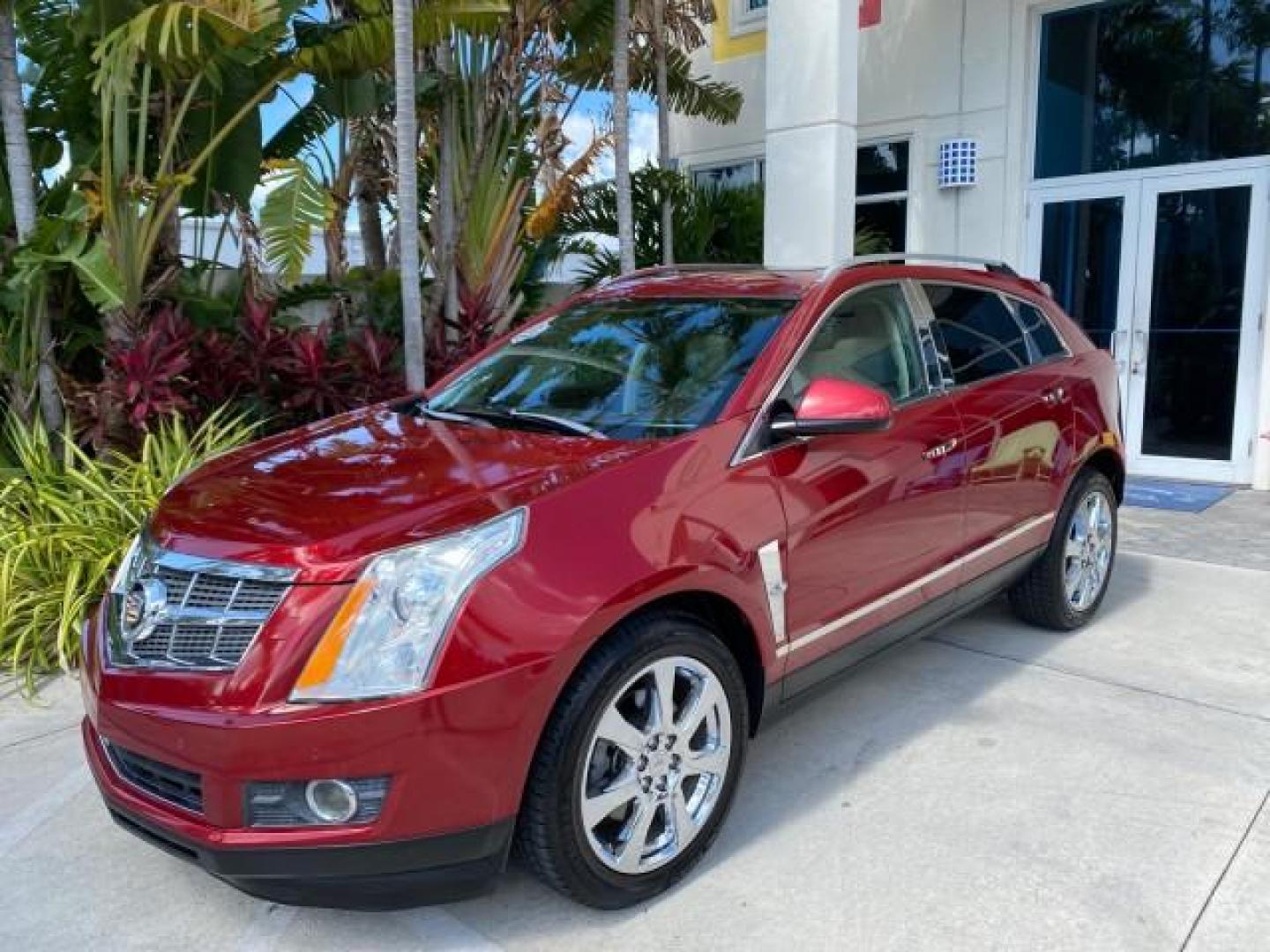 2012 Crystal Red Tintcoat /Shale w/Brownstone accents Cadillac SRX Performance Collection LOW MILES 34,731 (3GYFNBE32CS) with an 3.6L SIDI DOHC V6 VVT Engine engine, Automatic transmission, located at 4701 North Dixie Hwy, Pompano Beach, FL, 33064, (954) 422-2889, 26.240938, -80.123474 - OUR WEBPAGE FLORIDACARS1.COM HAS OVER 100 PHOTOS AND FREE CARFAX LINK 2012 Cadillac SRX 1 OWNER 4 Door Wagon/Sport Utility 3.6L V6 F DOHC 24V Gasoline 24 MPG Front Wheel Drive Features 20 Inch Plus Wheels ABS Brakes Air Conditioning Alloy Wheels AM/FM Stereo Automatic Transmission Auxiliary Audio In- Photo#29