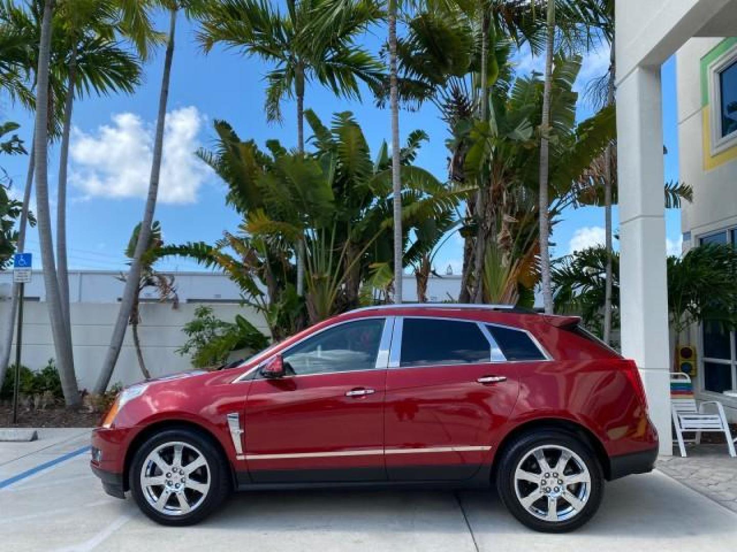 2012 Crystal Red Tintcoat /Shale w/Brownstone accents Cadillac SRX Performance Collection LOW MILES 34,731 (3GYFNBE32CS) with an 3.6L SIDI DOHC V6 VVT Engine engine, Automatic transmission, located at 4701 North Dixie Hwy, Pompano Beach, FL, 33064, (954) 422-2889, 26.240938, -80.123474 - OUR WEBPAGE FLORIDACARS1.COM HAS OVER 100 PHOTOS AND FREE CARFAX LINK 2012 Cadillac SRX 1 OWNER 4 Door Wagon/Sport Utility 3.6L V6 F DOHC 24V Gasoline 24 MPG Front Wheel Drive Features 20 Inch Plus Wheels ABS Brakes Air Conditioning Alloy Wheels AM/FM Stereo Automatic Transmission Auxiliary Audio In- Photo#30