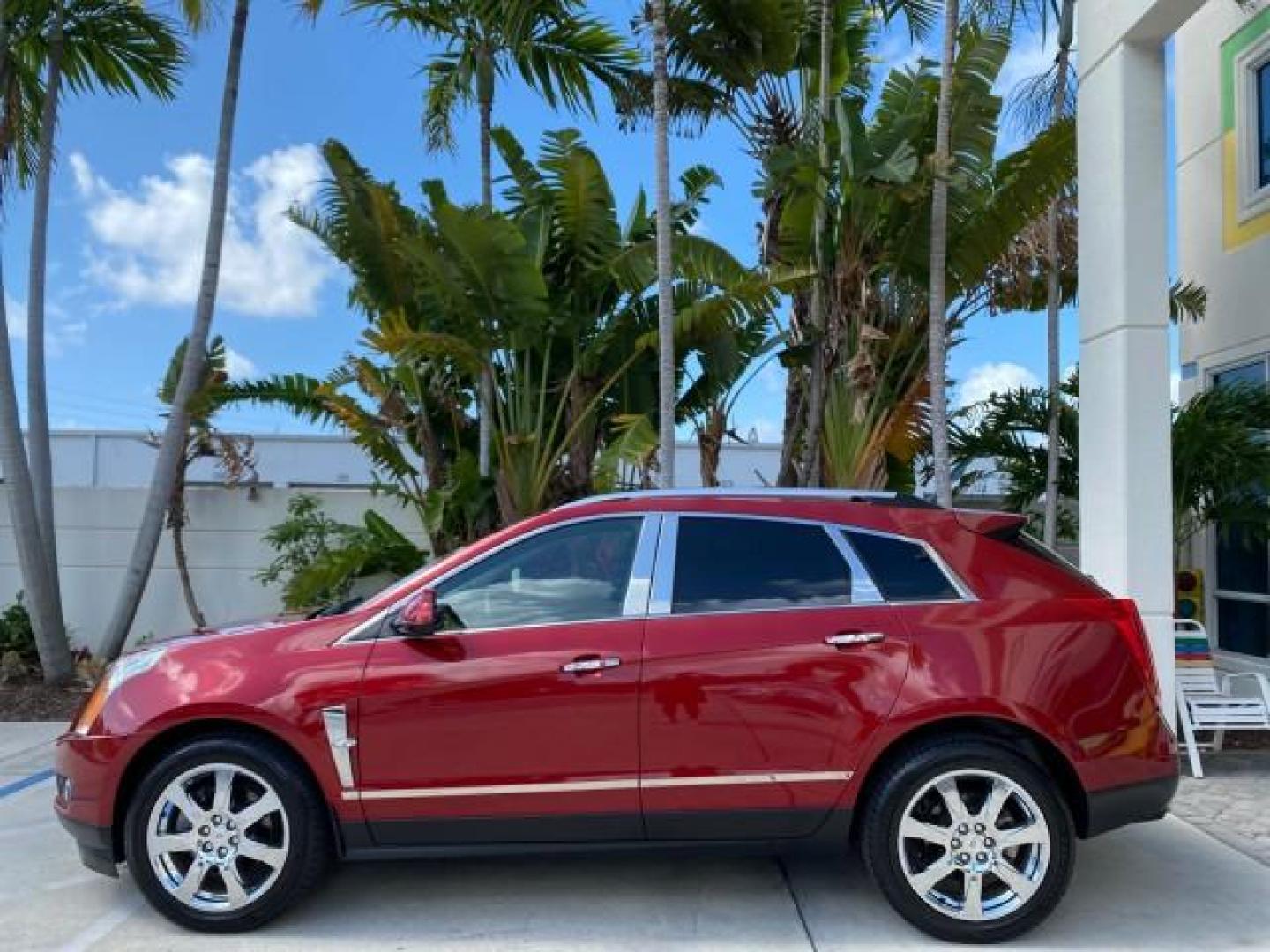 2012 Crystal Red Tintcoat /Shale w/Brownstone accents Cadillac SRX Performance Collection LOW MILES 34,731 (3GYFNBE32CS) with an 3.6L SIDI DOHC V6 VVT Engine engine, Automatic transmission, located at 4701 North Dixie Hwy, Pompano Beach, FL, 33064, (954) 422-2889, 26.240938, -80.123474 - OUR WEBPAGE FLORIDACARS1.COM HAS OVER 100 PHOTOS AND FREE CARFAX LINK 2012 Cadillac SRX 1 OWNER 4 Door Wagon/Sport Utility 3.6L V6 F DOHC 24V Gasoline 24 MPG Front Wheel Drive Features 20 Inch Plus Wheels ABS Brakes Air Conditioning Alloy Wheels AM/FM Stereo Automatic Transmission Auxiliary Audio In- Photo#31