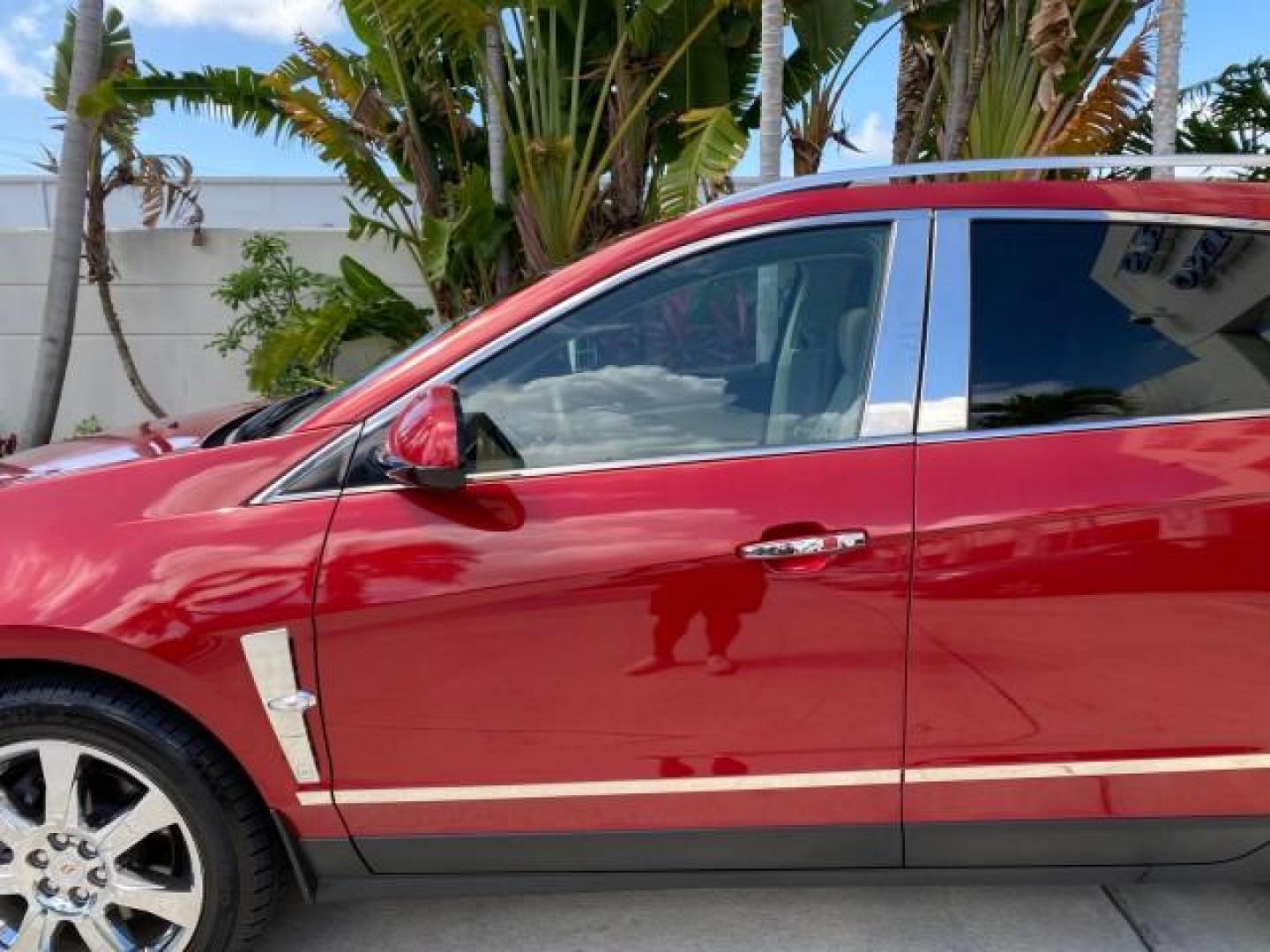 2012 Crystal Red Tintcoat /Shale w/Brownstone accents Cadillac SRX Performance Collection LOW MILES 34,731 (3GYFNBE32CS) with an 3.6L SIDI DOHC V6 VVT Engine engine, Automatic transmission, located at 4701 North Dixie Hwy, Pompano Beach, FL, 33064, (954) 422-2889, 26.240938, -80.123474 - OUR WEBPAGE FLORIDACARS1.COM HAS OVER 100 PHOTOS AND FREE CARFAX LINK 2012 Cadillac SRX 1 OWNER 4 Door Wagon/Sport Utility 3.6L V6 F DOHC 24V Gasoline 24 MPG Front Wheel Drive Features 20 Inch Plus Wheels ABS Brakes Air Conditioning Alloy Wheels AM/FM Stereo Automatic Transmission Auxiliary Audio In- Photo#36