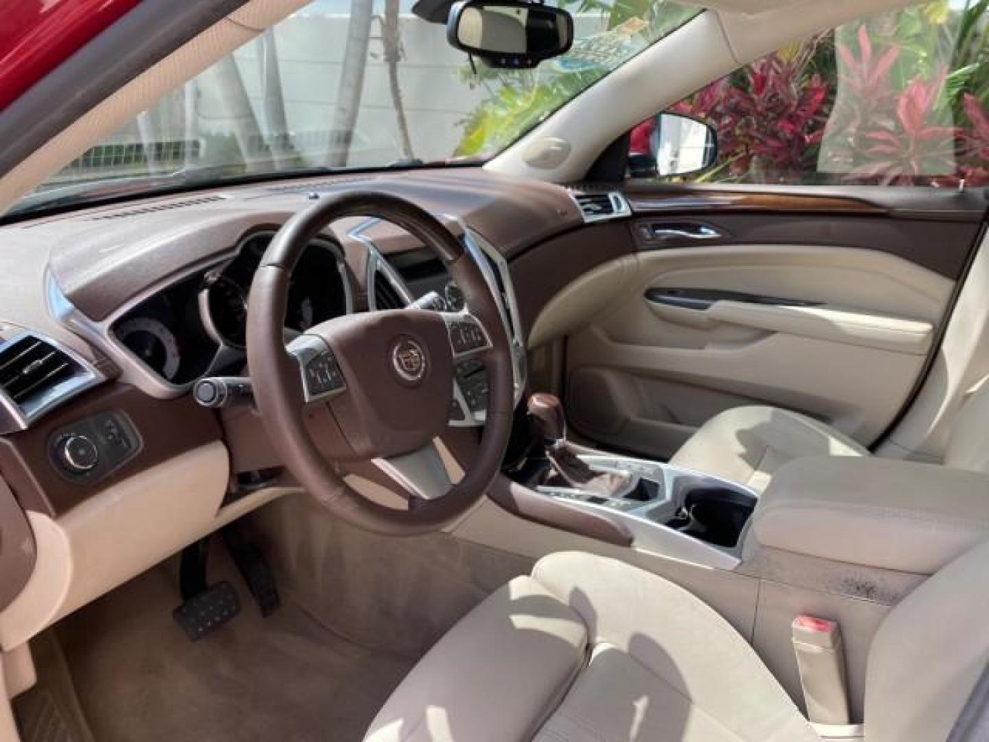 2012 Crystal Red Tintcoat /Shale w/Brownstone accents Cadillac SRX Performance Collection LOW MILES 34,731 (3GYFNBE32CS) with an 3.6L SIDI DOHC V6 VVT Engine engine, Automatic transmission, located at 4701 North Dixie Hwy, Pompano Beach, FL, 33064, (954) 422-2889, 26.240938, -80.123474 - OUR WEBPAGE FLORIDACARS1.COM HAS OVER 100 PHOTOS AND FREE CARFAX LINK 2012 Cadillac SRX 1 OWNER 4 Door Wagon/Sport Utility 3.6L V6 F DOHC 24V Gasoline 24 MPG Front Wheel Drive Features 20 Inch Plus Wheels ABS Brakes Air Conditioning Alloy Wheels AM/FM Stereo Automatic Transmission Auxiliary Audio In- Photo#46