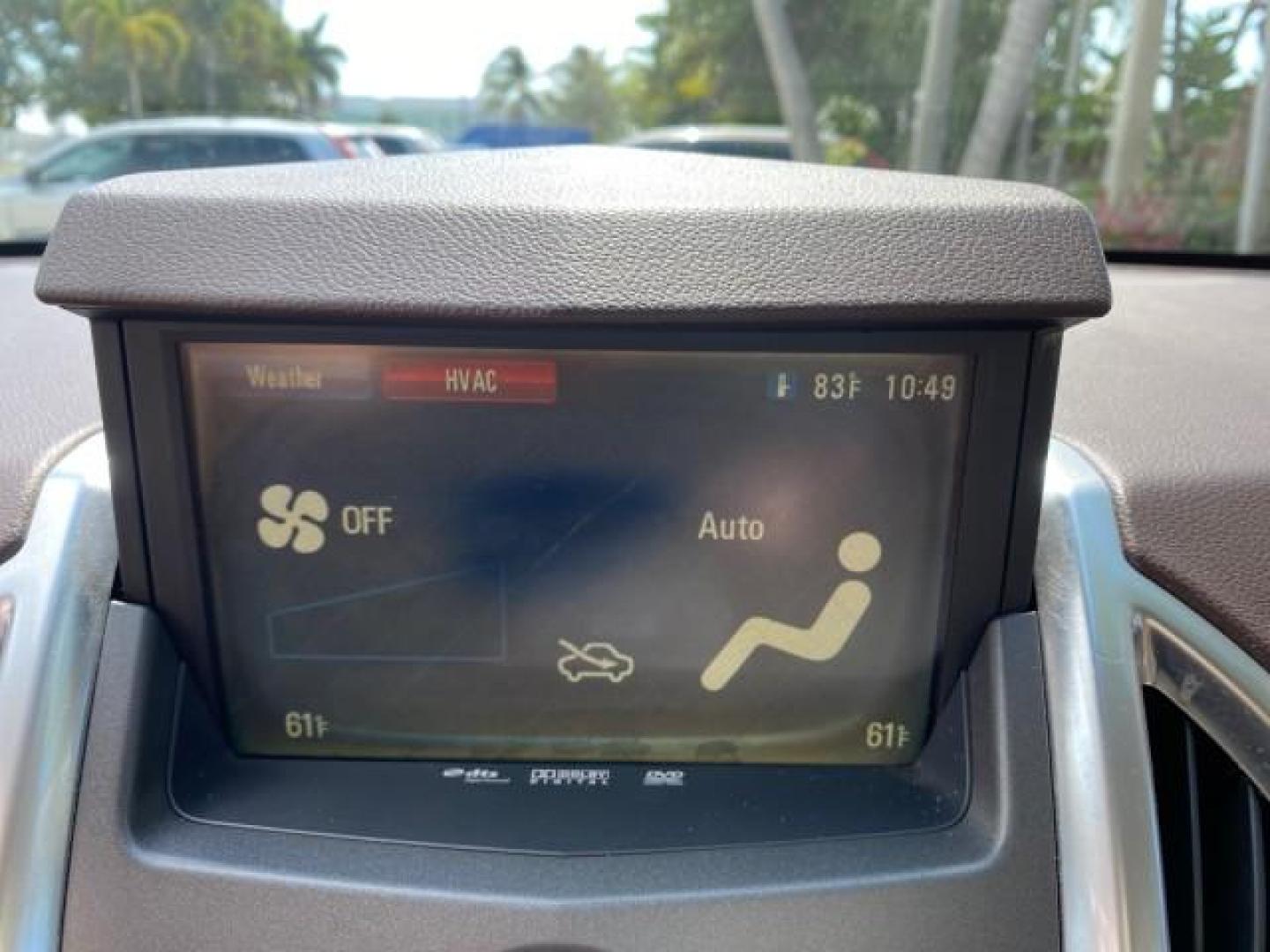 2012 Crystal Red Tintcoat /Shale w/Brownstone accents Cadillac SRX Performance Collection LOW MILES 34,731 (3GYFNBE32CS) with an 3.6L SIDI DOHC V6 VVT Engine engine, Automatic transmission, located at 4701 North Dixie Hwy, Pompano Beach, FL, 33064, (954) 422-2889, 26.240938, -80.123474 - OUR WEBPAGE FLORIDACARS1.COM HAS OVER 100 PHOTOS AND FREE CARFAX LINK 2012 Cadillac SRX 1 OWNER 4 Door Wagon/Sport Utility 3.6L V6 F DOHC 24V Gasoline 24 MPG Front Wheel Drive Features 20 Inch Plus Wheels ABS Brakes Air Conditioning Alloy Wheels AM/FM Stereo Automatic Transmission Auxiliary Audio In- Photo#57