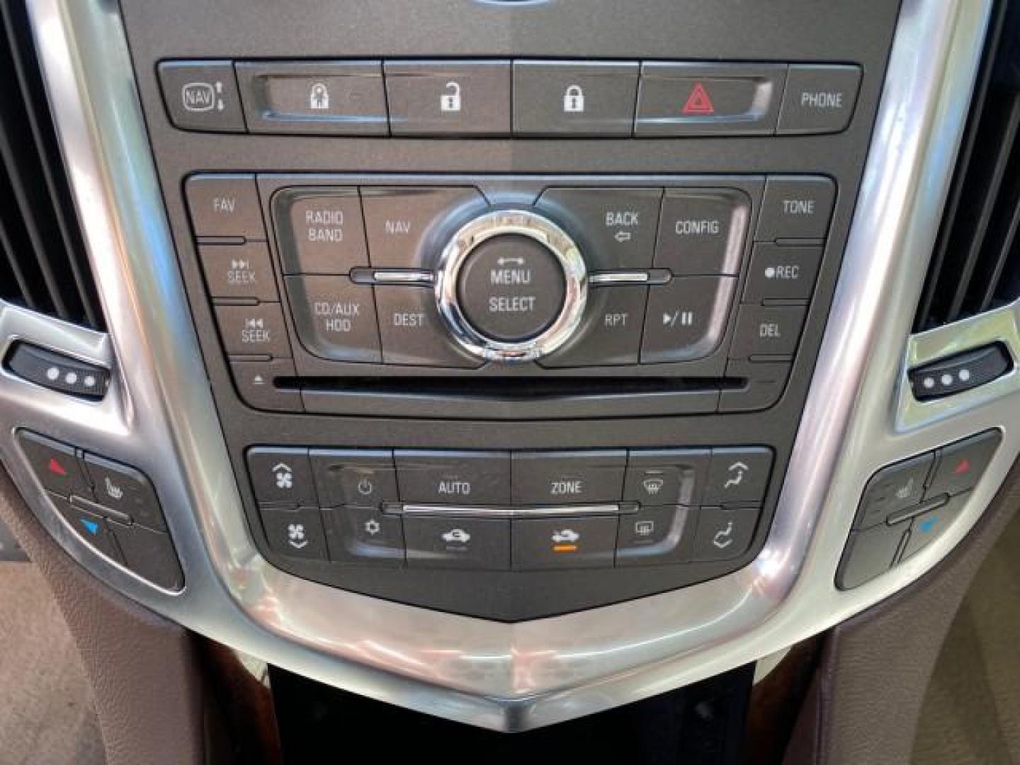 2012 Crystal Red Tintcoat /Shale w/Brownstone accents Cadillac SRX Performance Collection LOW MILES 34,731 (3GYFNBE32CS) with an 3.6L SIDI DOHC V6 VVT Engine engine, Automatic transmission, located at 4701 North Dixie Hwy, Pompano Beach, FL, 33064, (954) 422-2889, 26.240938, -80.123474 - OUR WEBPAGE FLORIDACARS1.COM HAS OVER 100 PHOTOS AND FREE CARFAX LINK 2012 Cadillac SRX 1 OWNER 4 Door Wagon/Sport Utility 3.6L V6 F DOHC 24V Gasoline 24 MPG Front Wheel Drive Features 20 Inch Plus Wheels ABS Brakes Air Conditioning Alloy Wheels AM/FM Stereo Automatic Transmission Auxiliary Audio In- Photo#59