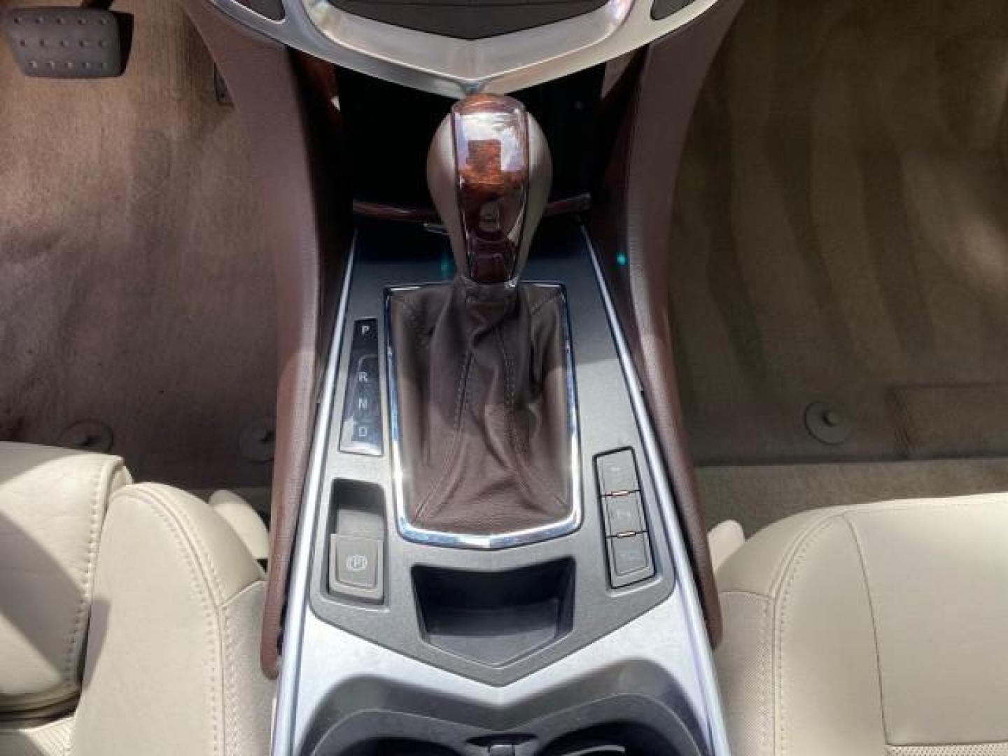 2012 Crystal Red Tintcoat /Shale w/Brownstone accents Cadillac SRX Performance Collection LOW MILES 34,731 (3GYFNBE32CS) with an 3.6L SIDI DOHC V6 VVT Engine engine, Automatic transmission, located at 4701 North Dixie Hwy, Pompano Beach, FL, 33064, (954) 422-2889, 26.240938, -80.123474 - OUR WEBPAGE FLORIDACARS1.COM HAS OVER 100 PHOTOS AND FREE CARFAX LINK 2012 Cadillac SRX 1 OWNER 4 Door Wagon/Sport Utility 3.6L V6 F DOHC 24V Gasoline 24 MPG Front Wheel Drive Features 20 Inch Plus Wheels ABS Brakes Air Conditioning Alloy Wheels AM/FM Stereo Automatic Transmission Auxiliary Audio In- Photo#62