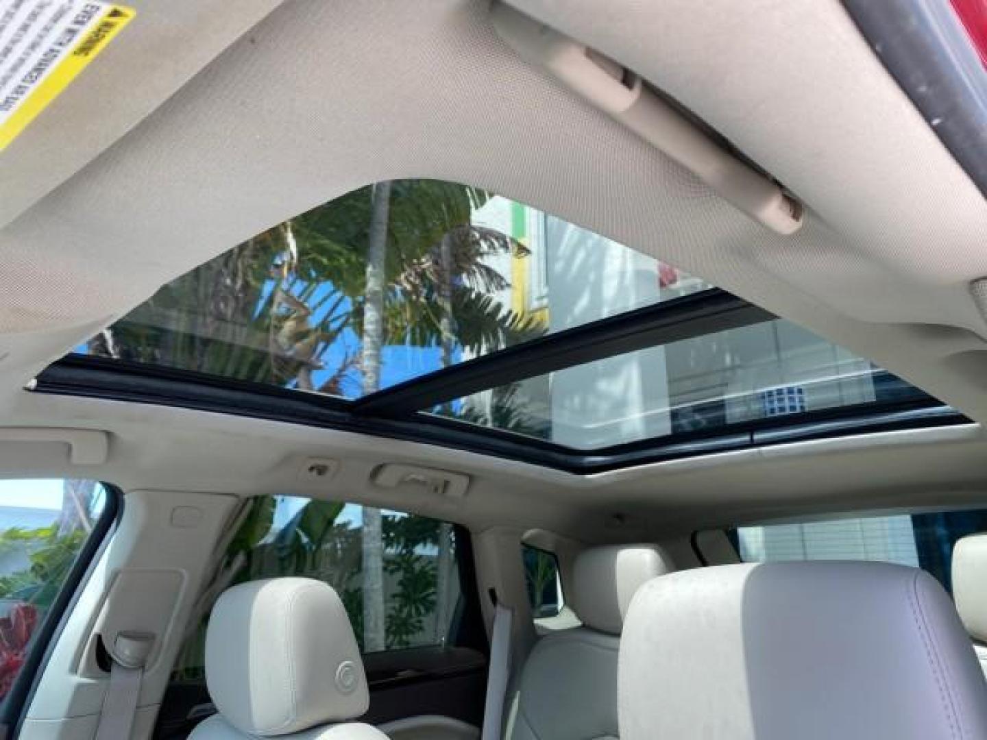 2012 Crystal Red Tintcoat /Shale w/Brownstone accents Cadillac SRX Performance Collection LOW MILES 34,731 (3GYFNBE32CS) with an 3.6L SIDI DOHC V6 VVT Engine engine, Automatic transmission, located at 4701 North Dixie Hwy, Pompano Beach, FL, 33064, (954) 422-2889, 26.240938, -80.123474 - OUR WEBPAGE FLORIDACARS1.COM HAS OVER 100 PHOTOS AND FREE CARFAX LINK 2012 Cadillac SRX 1 OWNER 4 Door Wagon/Sport Utility 3.6L V6 F DOHC 24V Gasoline 24 MPG Front Wheel Drive Features 20 Inch Plus Wheels ABS Brakes Air Conditioning Alloy Wheels AM/FM Stereo Automatic Transmission Auxiliary Audio In- Photo#73