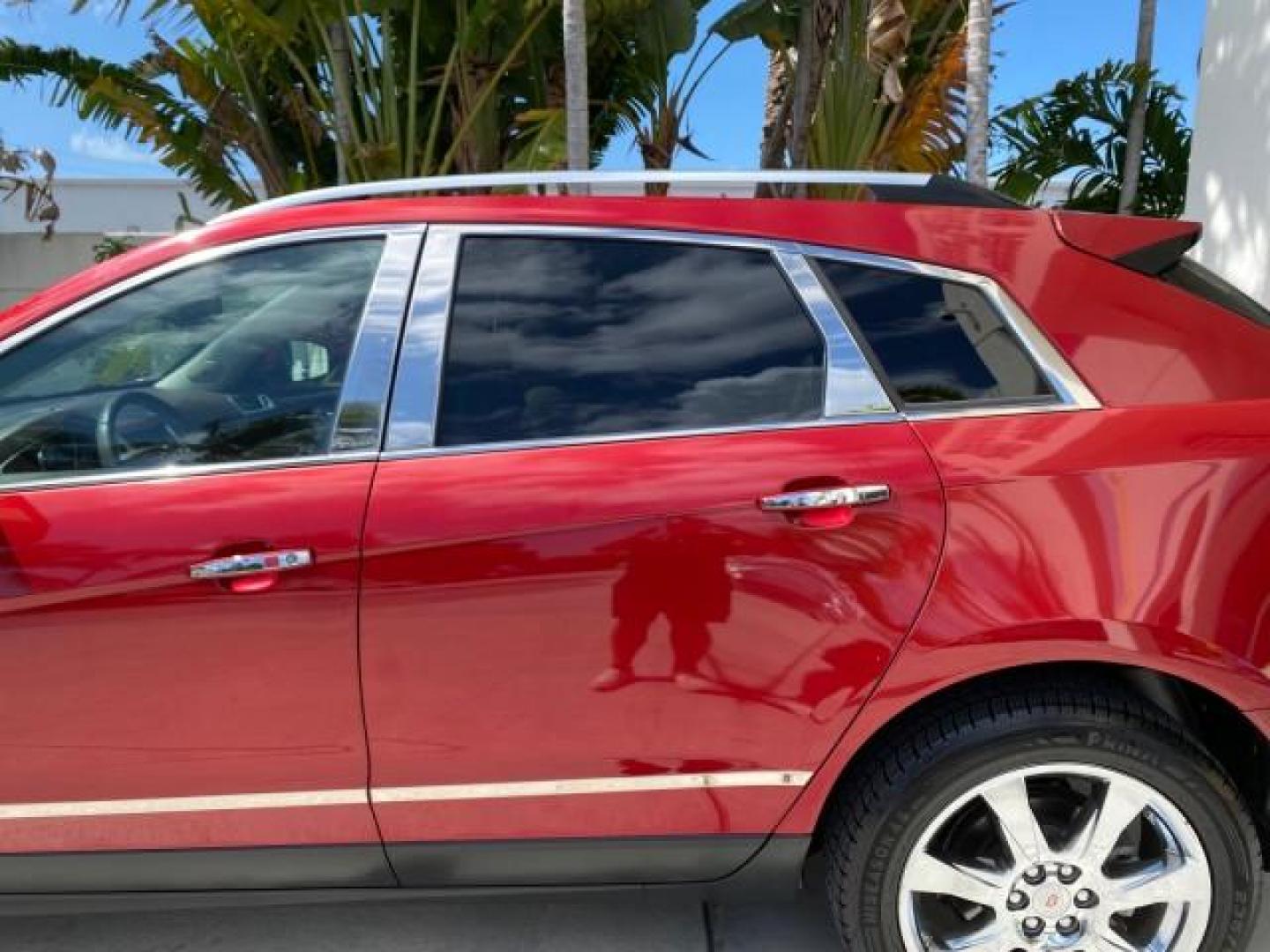 2012 Crystal Red Tintcoat /Shale w/Brownstone accents Cadillac SRX Performance Collection LOW MILES 34,731 (3GYFNBE32CS) with an 3.6L SIDI DOHC V6 VVT Engine engine, Automatic transmission, located at 4701 North Dixie Hwy, Pompano Beach, FL, 33064, (954) 422-2889, 26.240938, -80.123474 - OUR WEBPAGE FLORIDACARS1.COM HAS OVER 100 PHOTOS AND FREE CARFAX LINK 2012 Cadillac SRX 1 OWNER 4 Door Wagon/Sport Utility 3.6L V6 F DOHC 24V Gasoline 24 MPG Front Wheel Drive Features 20 Inch Plus Wheels ABS Brakes Air Conditioning Alloy Wheels AM/FM Stereo Automatic Transmission Auxiliary Audio In- Photo#77