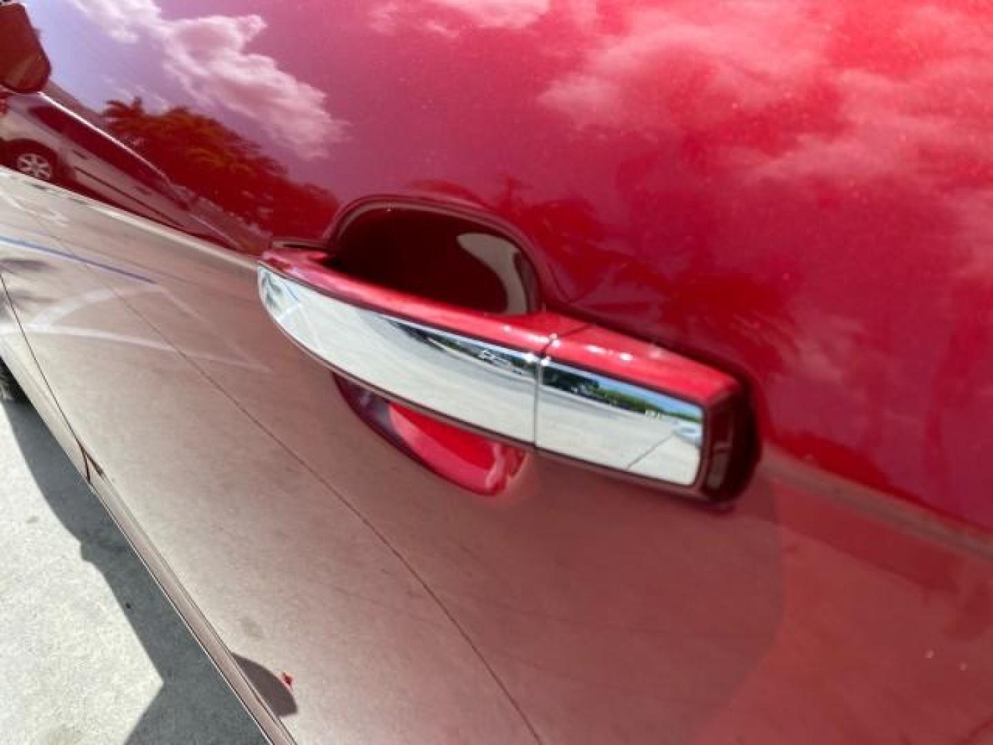 2012 Crystal Red Tintcoat /Shale w/Brownstone accents Cadillac SRX Performance Collection LOW MILES 34,731 (3GYFNBE32CS) with an 3.6L SIDI DOHC V6 VVT Engine engine, Automatic transmission, located at 4701 North Dixie Hwy, Pompano Beach, FL, 33064, (954) 422-2889, 26.240938, -80.123474 - OUR WEBPAGE FLORIDACARS1.COM HAS OVER 100 PHOTOS AND FREE CARFAX LINK 2012 Cadillac SRX 1 OWNER 4 Door Wagon/Sport Utility 3.6L V6 F DOHC 24V Gasoline 24 MPG Front Wheel Drive Features 20 Inch Plus Wheels ABS Brakes Air Conditioning Alloy Wheels AM/FM Stereo Automatic Transmission Auxiliary Audio In- Photo#78