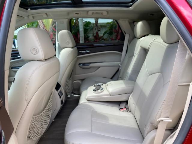 2012 Crystal Red Tintcoat /Shale w/Brownstone accents Cadillac SRX Performance Collection LOW MILES 34,731 (3GYFNBE32CS) with an 3.6L SIDI DOHC V6 VVT Engine engine, Automatic transmission, located at 4701 North Dixie Hwy, Pompano Beach, FL, 33064, (954) 422-2889, 26.240938, -80.123474 - OUR WEBPAGE FLORIDACARS1.COM HAS OVER 100 PHOTOS AND FREE CARFAX LINK 2012 Cadillac SRX 1 OWNER 4 Door Wagon/Sport Utility 3.6L V6 F DOHC 24V Gasoline 24 MPG Front Wheel Drive Features 20 Inch Plus Wheels ABS Brakes Air Conditioning Alloy Wheels AM/FM Stereo Automatic Transmission Auxiliary Audio In - Photo#81