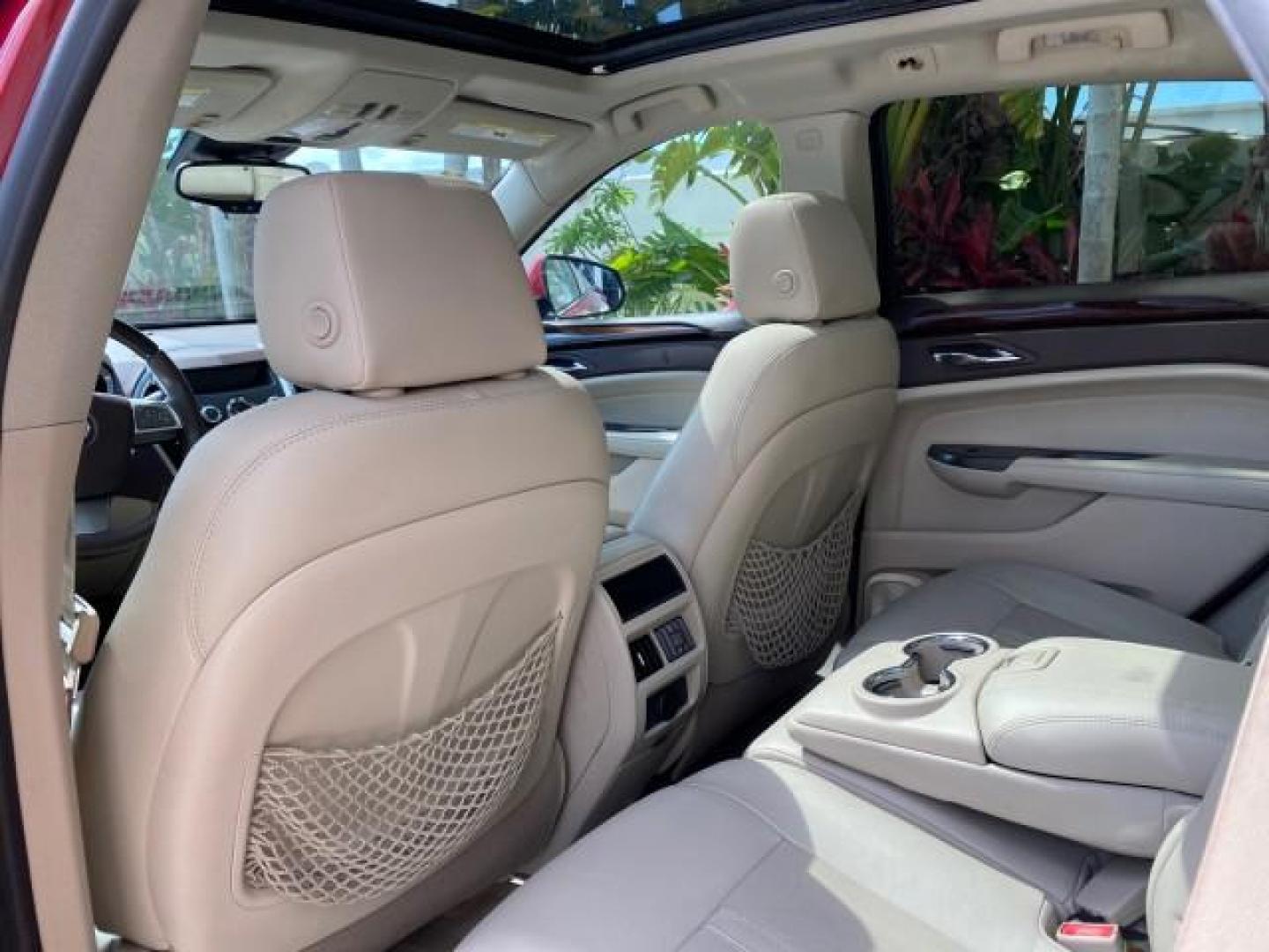 2012 Crystal Red Tintcoat /Shale w/Brownstone accents Cadillac SRX Performance Collection LOW MILES 34,731 (3GYFNBE32CS) with an 3.6L SIDI DOHC V6 VVT Engine engine, Automatic transmission, located at 4701 North Dixie Hwy, Pompano Beach, FL, 33064, (954) 422-2889, 26.240938, -80.123474 - OUR WEBPAGE FLORIDACARS1.COM HAS OVER 100 PHOTOS AND FREE CARFAX LINK 2012 Cadillac SRX 1 OWNER 4 Door Wagon/Sport Utility 3.6L V6 F DOHC 24V Gasoline 24 MPG Front Wheel Drive Features 20 Inch Plus Wheels ABS Brakes Air Conditioning Alloy Wheels AM/FM Stereo Automatic Transmission Auxiliary Audio In- Photo#83