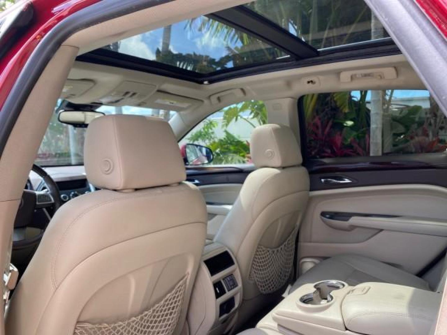 2012 Crystal Red Tintcoat /Shale w/Brownstone accents Cadillac SRX Performance Collection LOW MILES 34,731 (3GYFNBE32CS) with an 3.6L SIDI DOHC V6 VVT Engine engine, Automatic transmission, located at 4701 North Dixie Hwy, Pompano Beach, FL, 33064, (954) 422-2889, 26.240938, -80.123474 - OUR WEBPAGE FLORIDACARS1.COM HAS OVER 100 PHOTOS AND FREE CARFAX LINK 2012 Cadillac SRX 1 OWNER 4 Door Wagon/Sport Utility 3.6L V6 F DOHC 24V Gasoline 24 MPG Front Wheel Drive Features 20 Inch Plus Wheels ABS Brakes Air Conditioning Alloy Wheels AM/FM Stereo Automatic Transmission Auxiliary Audio In- Photo#84