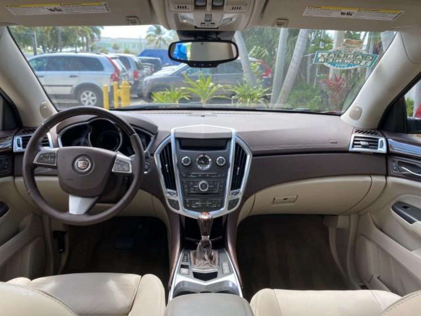2012 Crystal Red Tintcoat /Shale w/Brownstone accents Cadillac SRX Performance Collection LOW MILES 34,731 (3GYFNBE32CS) with an 3.6L SIDI DOHC V6 VVT Engine engine, Automatic transmission, located at 4701 North Dixie Hwy, Pompano Beach, FL, 33064, (954) 422-2889, 26.240938, -80.123474 - OUR WEBPAGE FLORIDACARS1.COM HAS OVER 100 PHOTOS AND FREE CARFAX LINK 2012 Cadillac SRX 1 OWNER 4 Door Wagon/Sport Utility 3.6L V6 F DOHC 24V Gasoline 24 MPG Front Wheel Drive Features 20 Inch Plus Wheels ABS Brakes Air Conditioning Alloy Wheels AM/FM Stereo Automatic Transmission Auxiliary Audio In- Photo#86