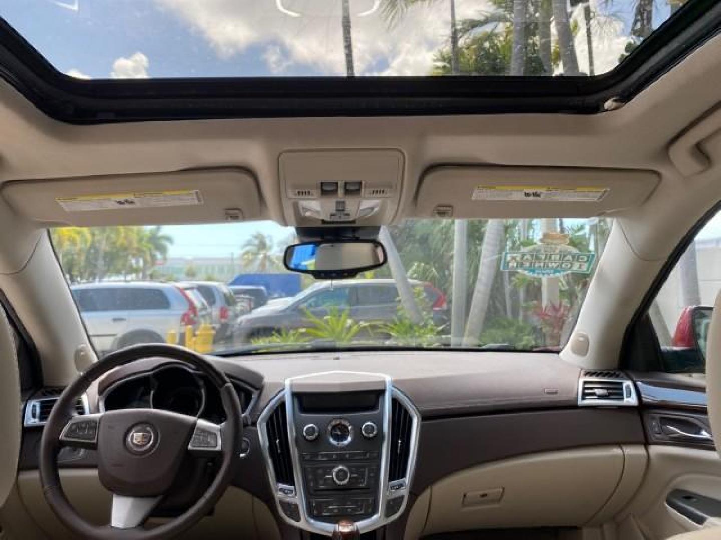 2012 Crystal Red Tintcoat /Shale w/Brownstone accents Cadillac SRX Performance Collection LOW MILES 34,731 (3GYFNBE32CS) with an 3.6L SIDI DOHC V6 VVT Engine engine, Automatic transmission, located at 4701 North Dixie Hwy, Pompano Beach, FL, 33064, (954) 422-2889, 26.240938, -80.123474 - OUR WEBPAGE FLORIDACARS1.COM HAS OVER 100 PHOTOS AND FREE CARFAX LINK 2012 Cadillac SRX 1 OWNER 4 Door Wagon/Sport Utility 3.6L V6 F DOHC 24V Gasoline 24 MPG Front Wheel Drive Features 20 Inch Plus Wheels ABS Brakes Air Conditioning Alloy Wheels AM/FM Stereo Automatic Transmission Auxiliary Audio In- Photo#87
