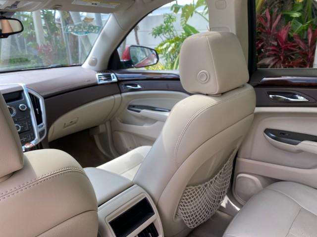 2012 Crystal Red Tintcoat /Shale w/Brownstone accents Cadillac SRX Performance Collection LOW MILES 34,731 (3GYFNBE32CS) with an 3.6L SIDI DOHC V6 VVT Engine engine, Automatic transmission, located at 4701 North Dixie Hwy, Pompano Beach, FL, 33064, (954) 422-2889, 26.240938, -80.123474 - OUR WEBPAGE FLORIDACARS1.COM HAS OVER 100 PHOTOS AND FREE CARFAX LINK 2012 Cadillac SRX 1 OWNER 4 Door Wagon/Sport Utility 3.6L V6 F DOHC 24V Gasoline 24 MPG Front Wheel Drive Features 20 Inch Plus Wheels ABS Brakes Air Conditioning Alloy Wheels AM/FM Stereo Automatic Transmission Auxiliary Audio In - Photo#89