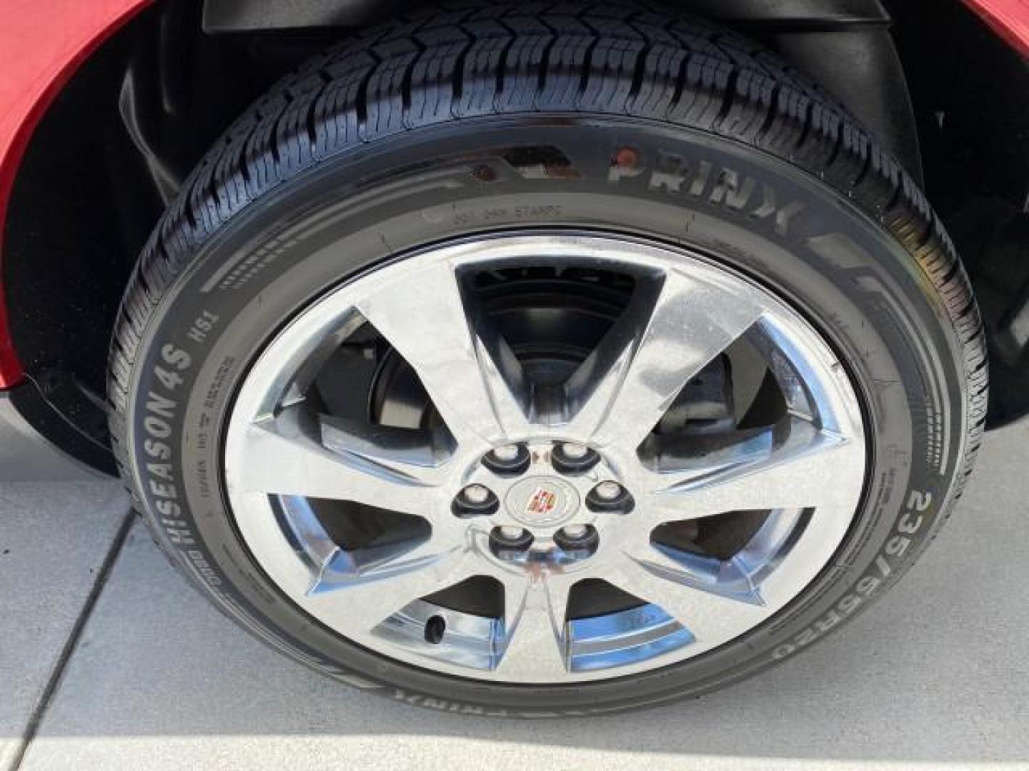 2012 Crystal Red Tintcoat /Shale w/Brownstone accents Cadillac SRX Performance Collection LOW MILES 34,731 (3GYFNBE32CS) with an 3.6L SIDI DOHC V6 VVT Engine engine, Automatic transmission, located at 4701 North Dixie Hwy, Pompano Beach, FL, 33064, (954) 422-2889, 26.240938, -80.123474 - OUR WEBPAGE FLORIDACARS1.COM HAS OVER 100 PHOTOS AND FREE CARFAX LINK 2012 Cadillac SRX 1 OWNER 4 Door Wagon/Sport Utility 3.6L V6 F DOHC 24V Gasoline 24 MPG Front Wheel Drive Features 20 Inch Plus Wheels ABS Brakes Air Conditioning Alloy Wheels AM/FM Stereo Automatic Transmission Auxiliary Audio In- Photo#90