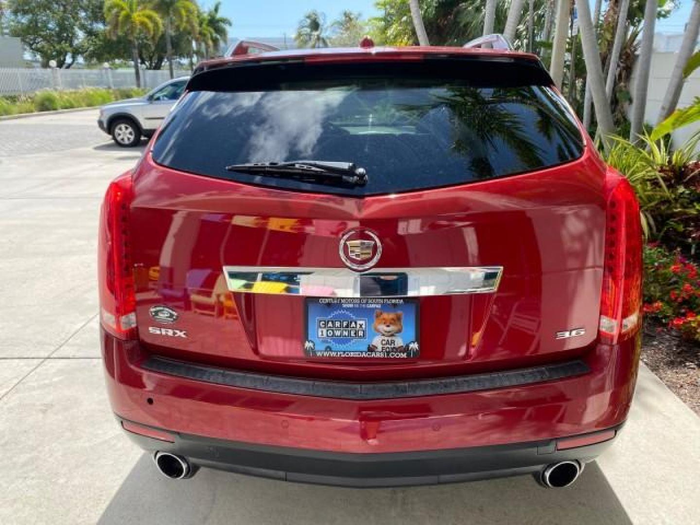 2012 Crystal Red Tintcoat /Shale w/Brownstone accents Cadillac SRX Performance Collection LOW MILES 34,731 (3GYFNBE32CS) with an 3.6L SIDI DOHC V6 VVT Engine engine, Automatic transmission, located at 4701 North Dixie Hwy, Pompano Beach, FL, 33064, (954) 422-2889, 26.240938, -80.123474 - OUR WEBPAGE FLORIDACARS1.COM HAS OVER 100 PHOTOS AND FREE CARFAX LINK 2012 Cadillac SRX 1 OWNER 4 Door Wagon/Sport Utility 3.6L V6 F DOHC 24V Gasoline 24 MPG Front Wheel Drive Features 20 Inch Plus Wheels ABS Brakes Air Conditioning Alloy Wheels AM/FM Stereo Automatic Transmission Auxiliary Audio In- Photo#93