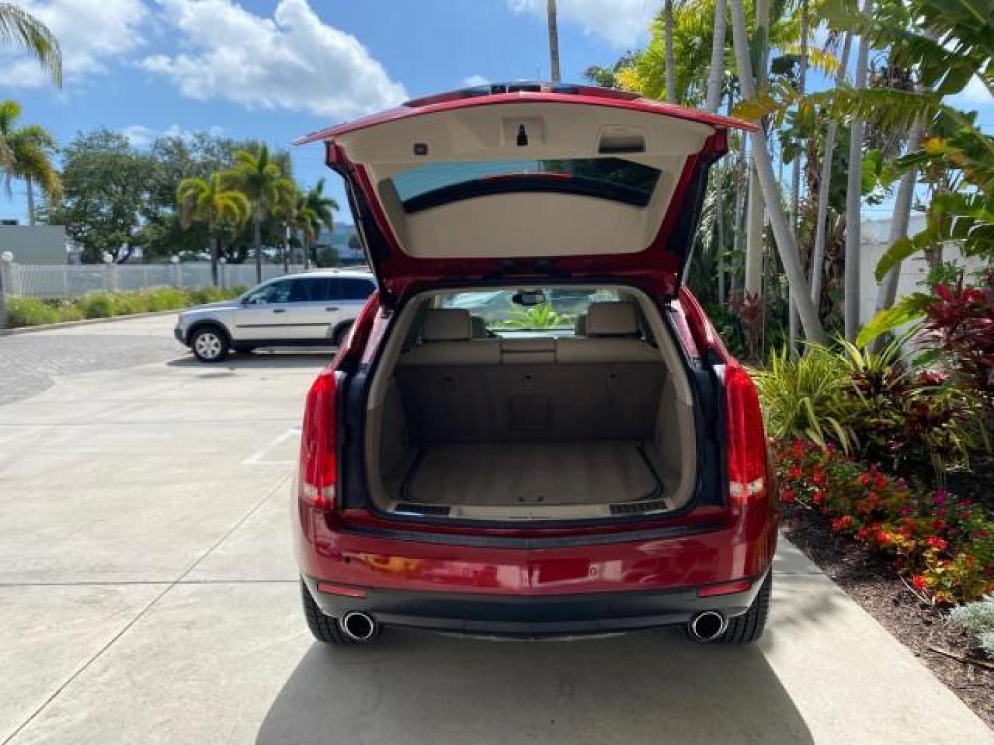 2012 Crystal Red Tintcoat /Shale w/Brownstone accents Cadillac SRX Performance Collection LOW MILES 34,731 (3GYFNBE32CS) with an 3.6L SIDI DOHC V6 VVT Engine engine, Automatic transmission, located at 4701 North Dixie Hwy, Pompano Beach, FL, 33064, (954) 422-2889, 26.240938, -80.123474 - OUR WEBPAGE FLORIDACARS1.COM HAS OVER 100 PHOTOS AND FREE CARFAX LINK 2012 Cadillac SRX 1 OWNER 4 Door Wagon/Sport Utility 3.6L V6 F DOHC 24V Gasoline 24 MPG Front Wheel Drive Features 20 Inch Plus Wheels ABS Brakes Air Conditioning Alloy Wheels AM/FM Stereo Automatic Transmission Auxiliary Audio In- Photo#99