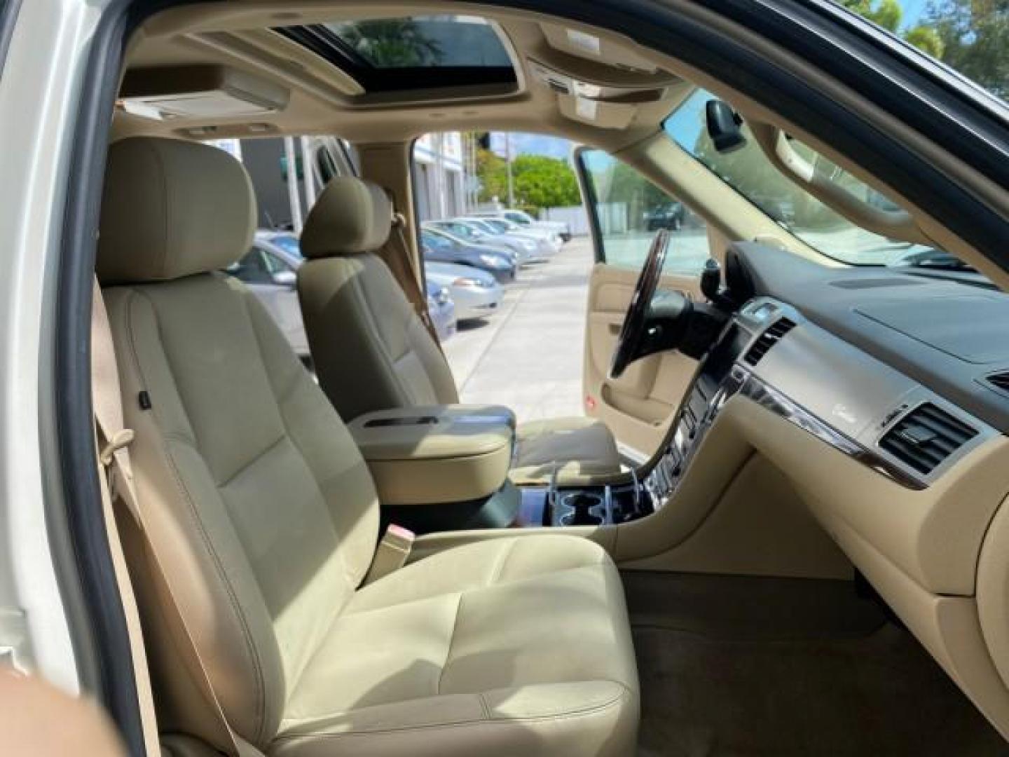 2010 White Diamond Tricoat /Cashmere/Cocoa Cadillac Escalade SUNROOF NAV Premium LOW MILES 66,933 (1GYUCCEF3AR) with an 6.2L Vortec 1000 V8 SFI E85 Engine engine, Automatic transmission, located at 4701 North Dixie Hwy, Pompano Beach, FL, 33064, (954) 422-2889, 26.240938, -80.123474 - OUR WEBPAGE FLORIDACARS1.COM HAS OVER 100 PHOTOS AND FREE CARFAX LINK 2010 Cadillac Escalade Premium 4 Door Wagon/Sport Utility 6.2L V8 F OHV 16V Flex Fuel 20 MPG Rear Wheel Drive Features A/C Seat(s) ABS Brakes Air Conditioning Alloy Wheels AM/FM Stereo Automatic Transmission Auxiliary Audio Input- Photo#12