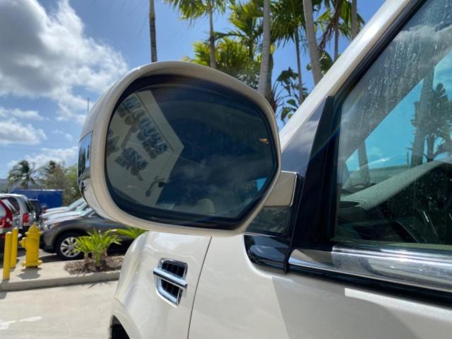 2010 White Diamond Tricoat /Cashmere/Cocoa Cadillac Escalade SUNROOF NAV Premium LOW MILES 66,933 (1GYUCCEF3AR) with an 6.2L Vortec 1000 V8 SFI E85 Engine engine, Automatic transmission, located at 4701 North Dixie Hwy, Pompano Beach, FL, 33064, (954) 422-2889, 26.240938, -80.123474 - OUR WEBPAGE FLORIDACARS1.COM HAS OVER 100 PHOTOS AND FREE CARFAX LINK 2010 Cadillac Escalade Premium 4 Door Wagon/Sport Utility 6.2L V8 F OHV 16V Flex Fuel 20 MPG Rear Wheel Drive Features A/C Seat(s) ABS Brakes Air Conditioning Alloy Wheels AM/FM Stereo Automatic Transmission Auxiliary Audio Input- Photo#39