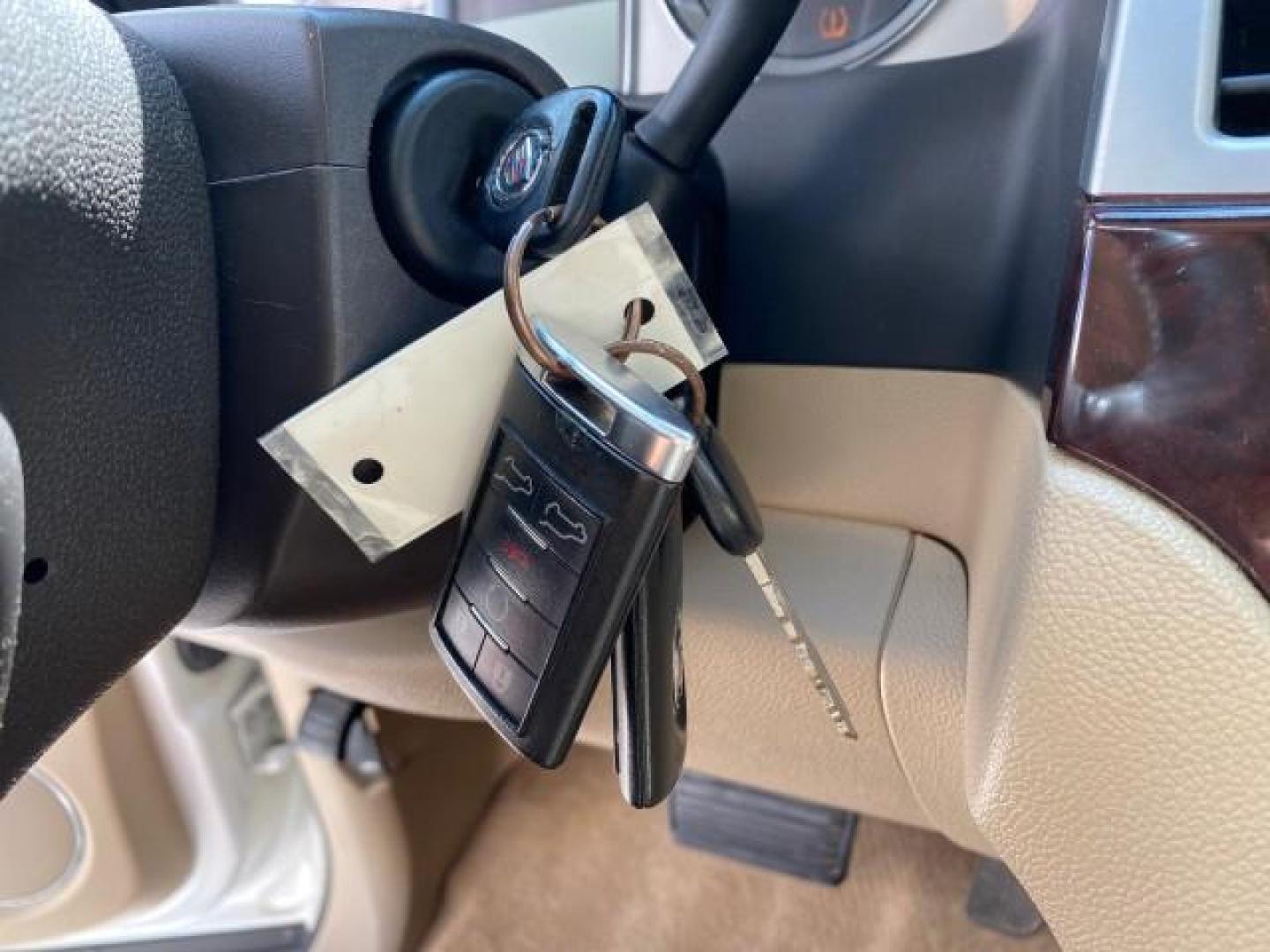 2010 White Diamond Tricoat /Cashmere/Cocoa Cadillac Escalade SUNROOF NAV Premium LOW MILES 66,933 (1GYUCCEF3AR) with an 6.2L Vortec 1000 V8 SFI E85 Engine engine, Automatic transmission, located at 4701 North Dixie Hwy, Pompano Beach, FL, 33064, (954) 422-2889, 26.240938, -80.123474 - OUR WEBPAGE FLORIDACARS1.COM HAS OVER 100 PHOTOS AND FREE CARFAX LINK 2010 Cadillac Escalade Premium 4 Door Wagon/Sport Utility 6.2L V8 F OHV 16V Flex Fuel 20 MPG Rear Wheel Drive Features A/C Seat(s) ABS Brakes Air Conditioning Alloy Wheels AM/FM Stereo Automatic Transmission Auxiliary Audio Input- Photo#59
